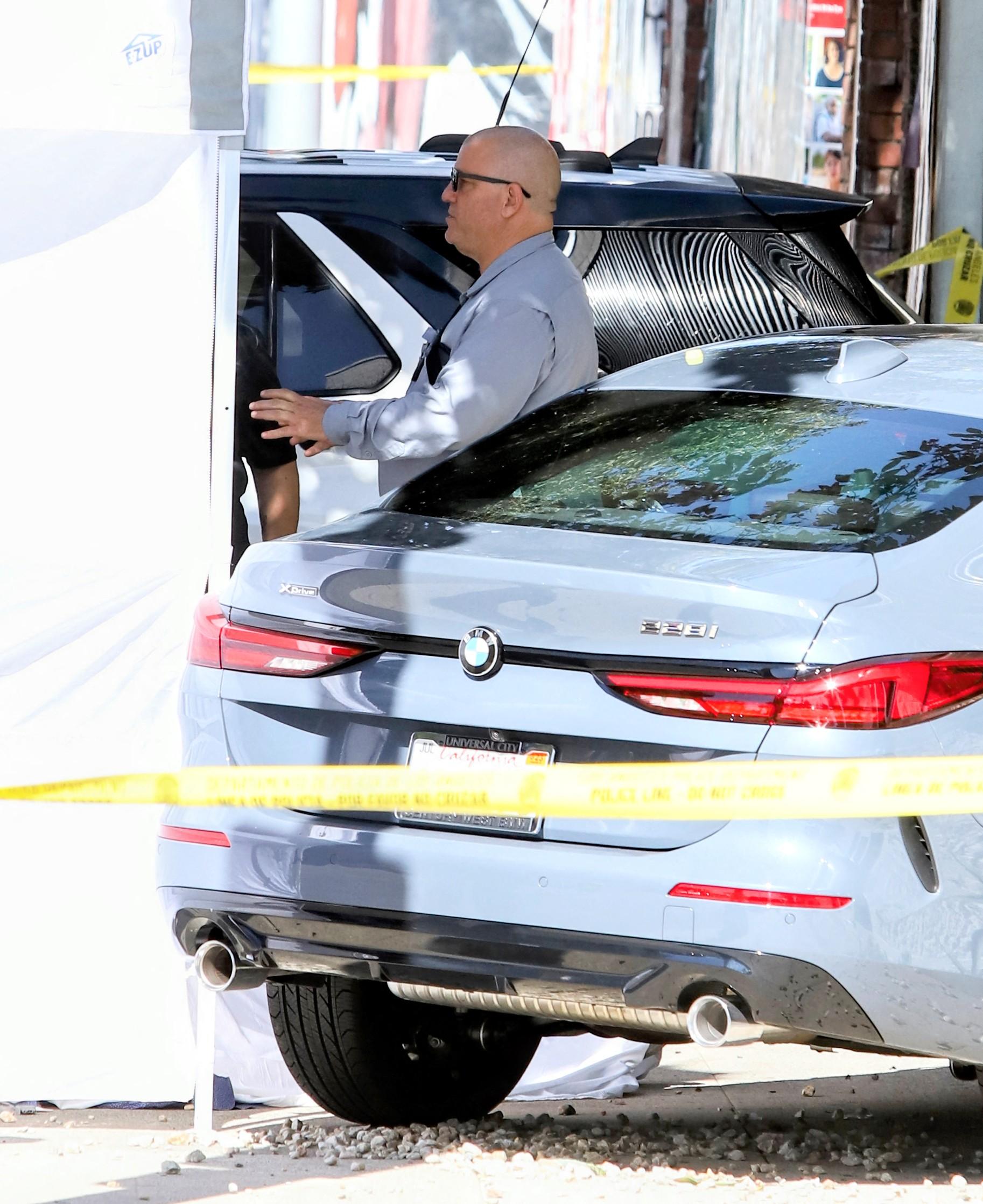 WARNING Contains Graphic Content The Los Angeles city coroner is seen at the crash site of Leslie Jordan who died this morning after reportedly suffered some sort of medical emergency and crashed his BMW into the side of a building in Hollywood C