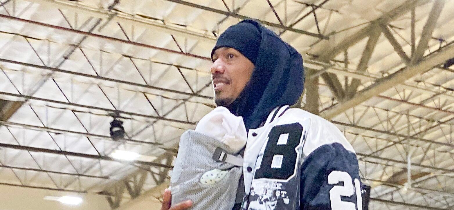 Nick Cannon proves hes a hands on dad as he steps out to his son apos s basketball game with a few of his kids including his new baby