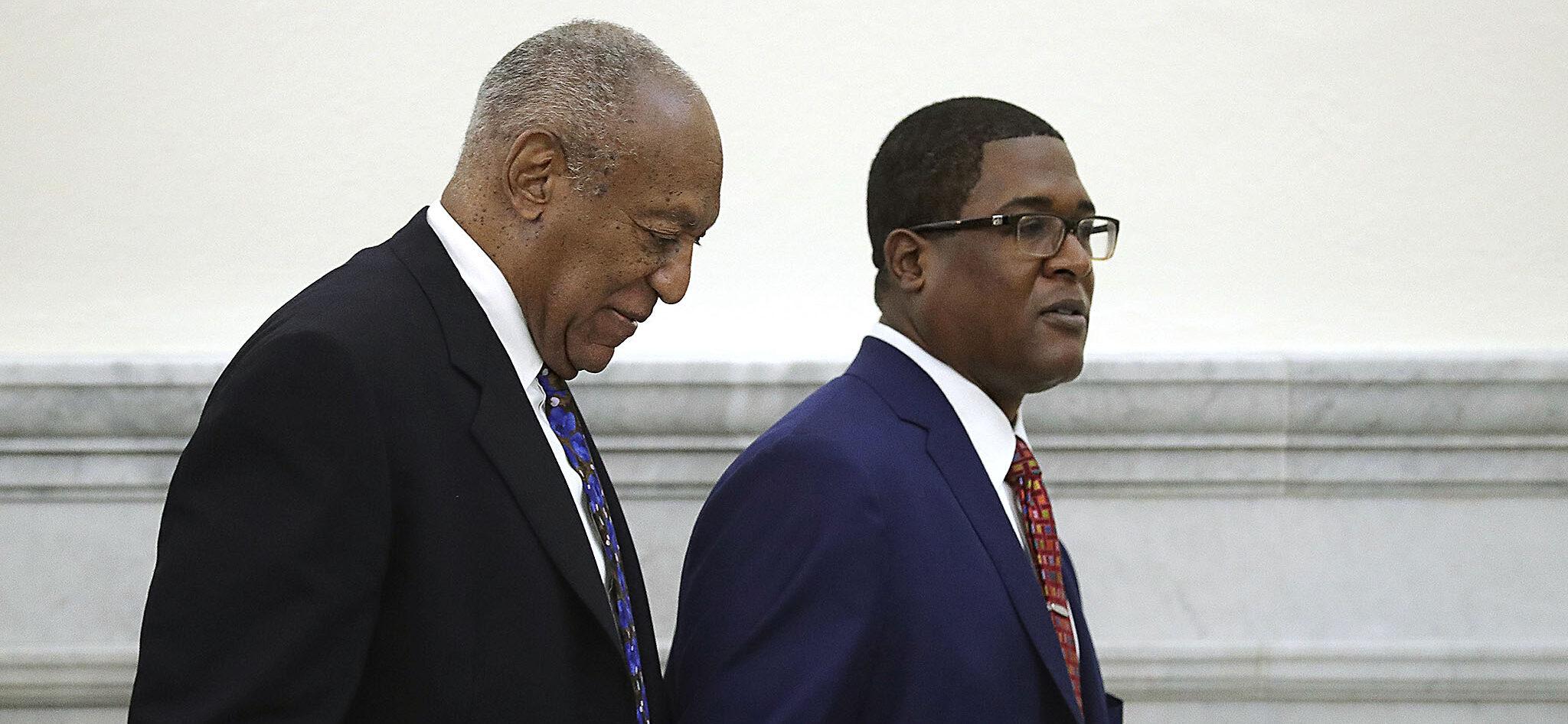 Bill Cosby is taken away in handcuffs after he was sentenced to three-to-10-years for felony sexual assault