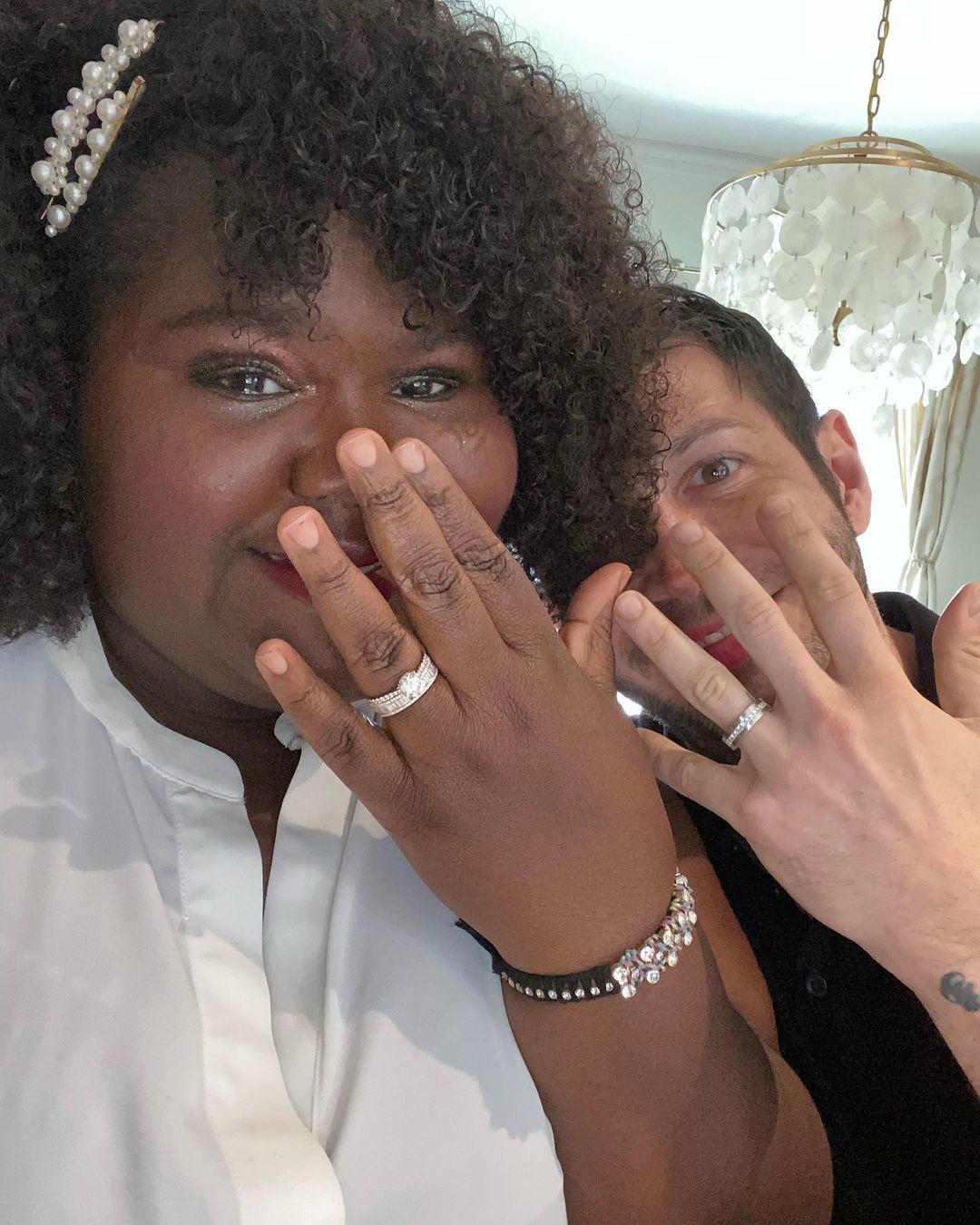 Gabby Sidibe and husband Brandon Frankel showing off their wedding rings