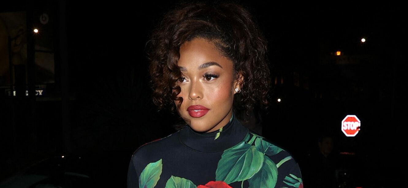 Jordyn Woods stuns in a Rose patterned dress as she steps out of a Rolls Royce for dinner at 'Madeo' Restaurant in West Hollywood, CA