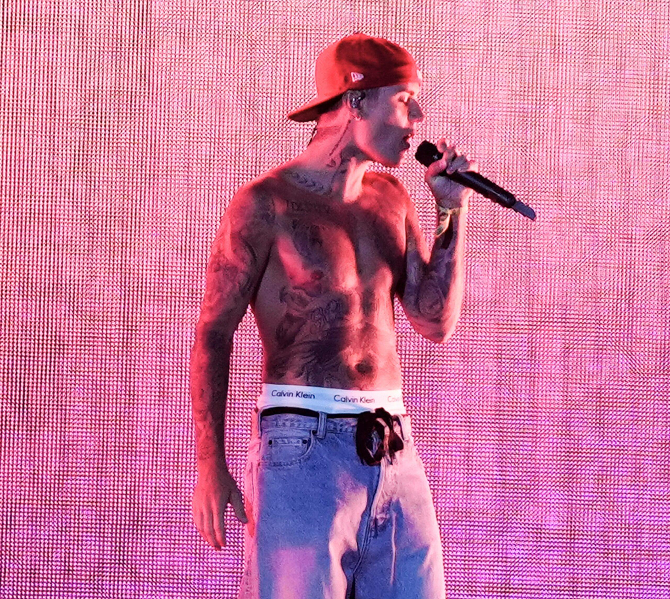 Justin Bieber goes shirtless performing with Justin Ceasar at Coachella Music Festival in Indio, CA