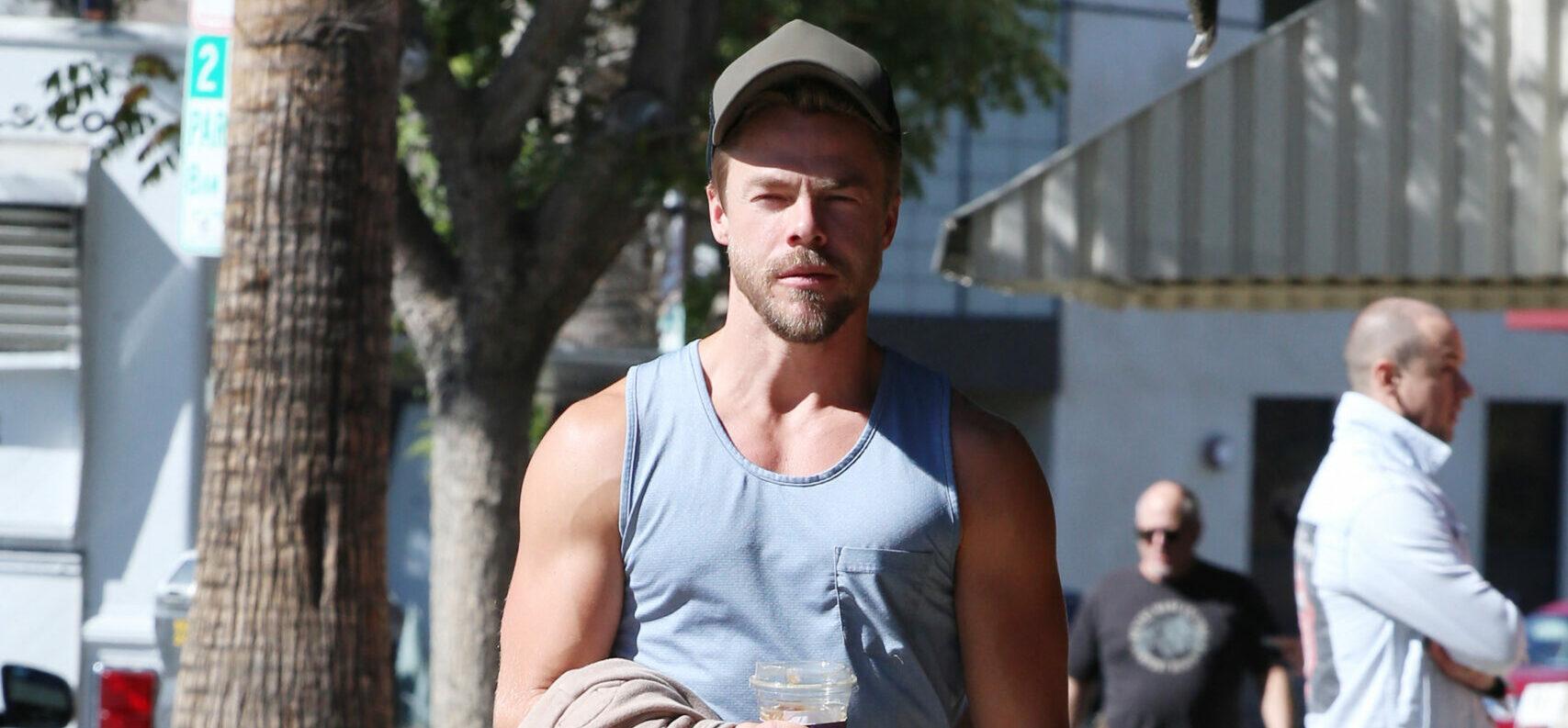 Derek Hough all smiles after finishing breakfast at Alfred coffee Saturday morning