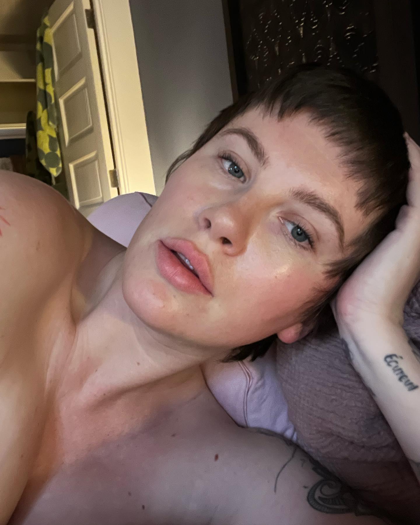 Ireland Baldwin hides her pregnant belly in topless selfies