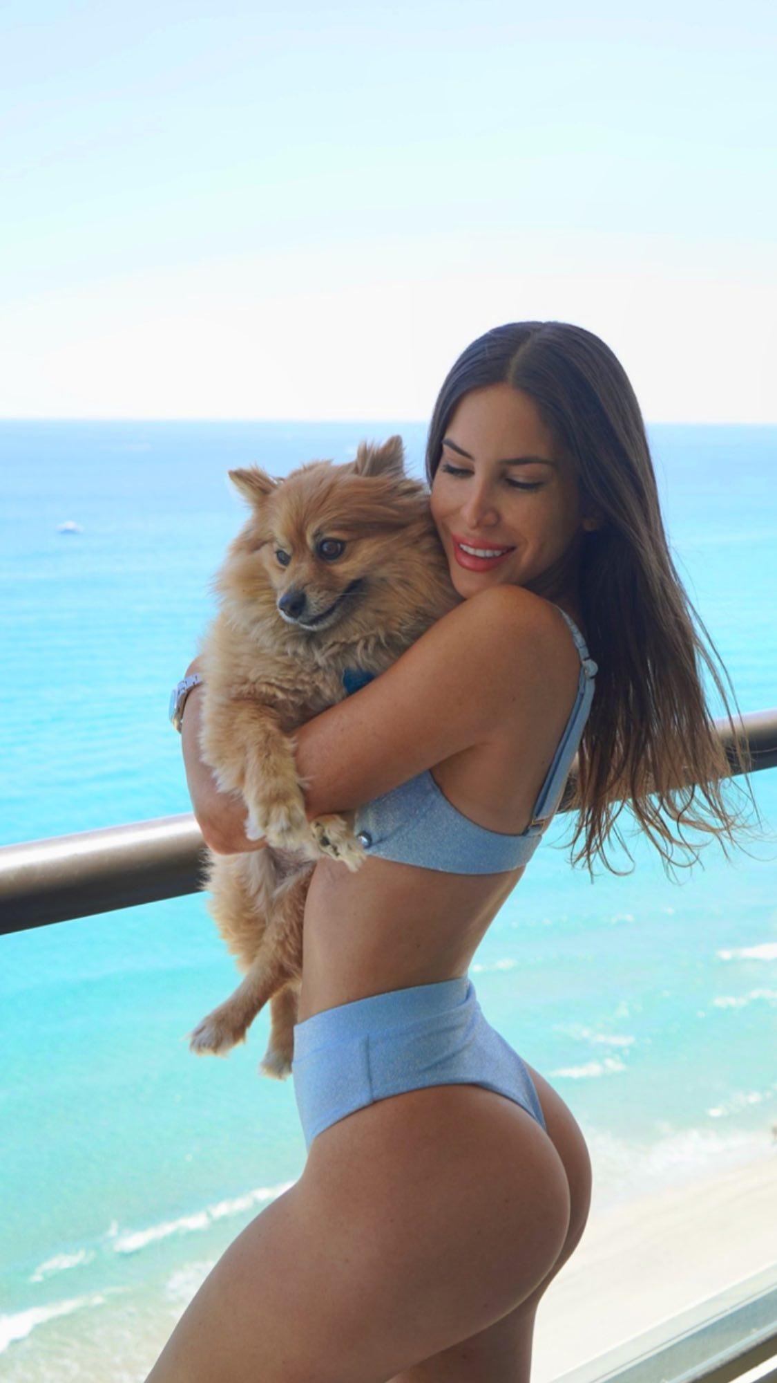 Jen Selter poses in a bikini with her dog Gram