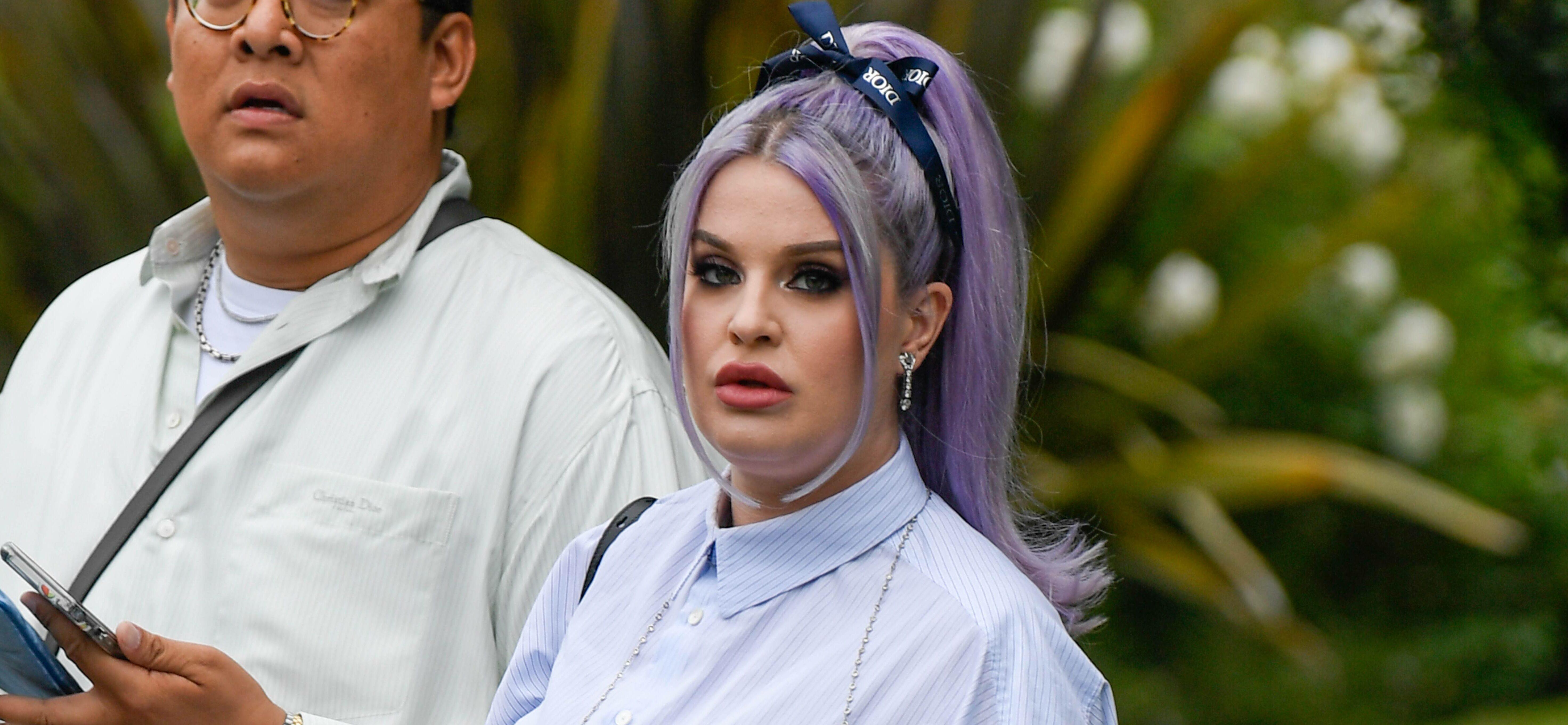 A pregnant Kelly Osbourne steps out for a Christian Dior show