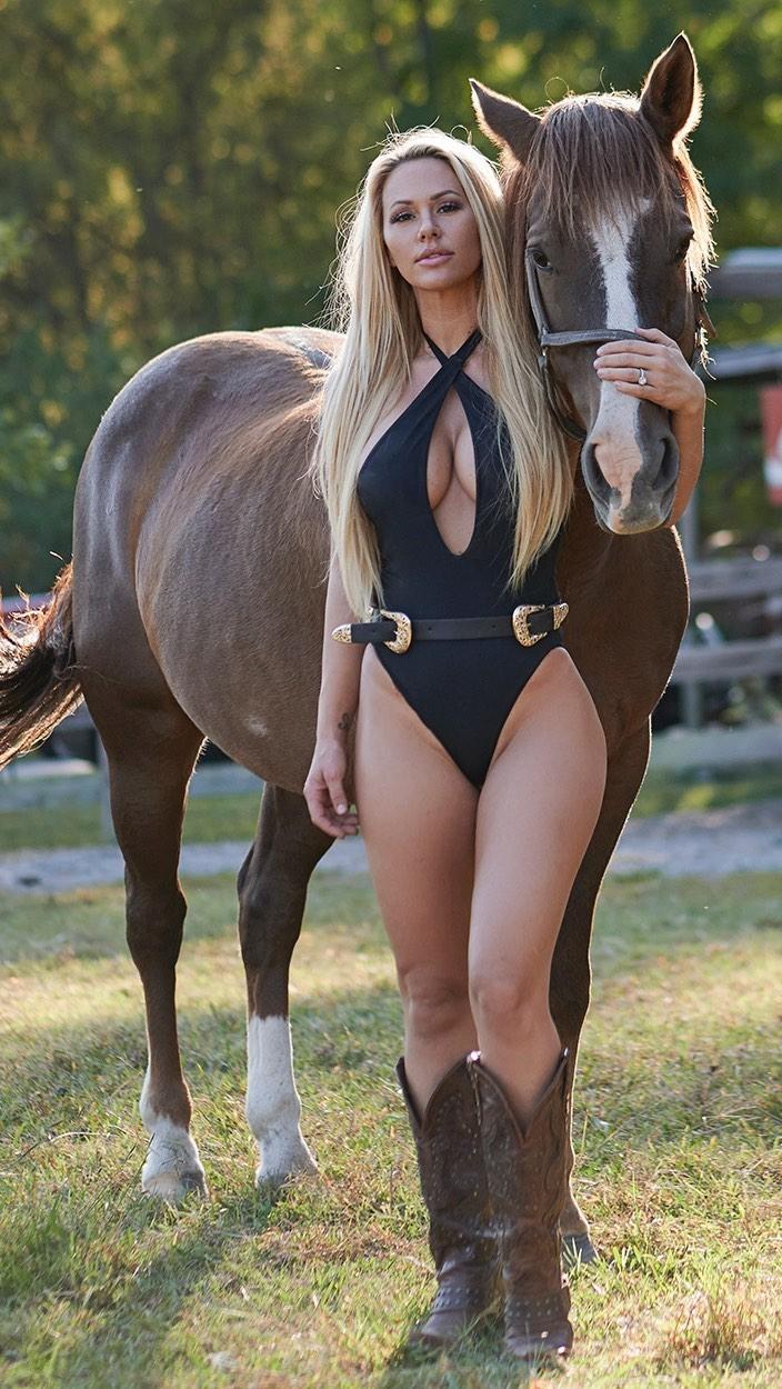 Kindly Myers poses with her horse