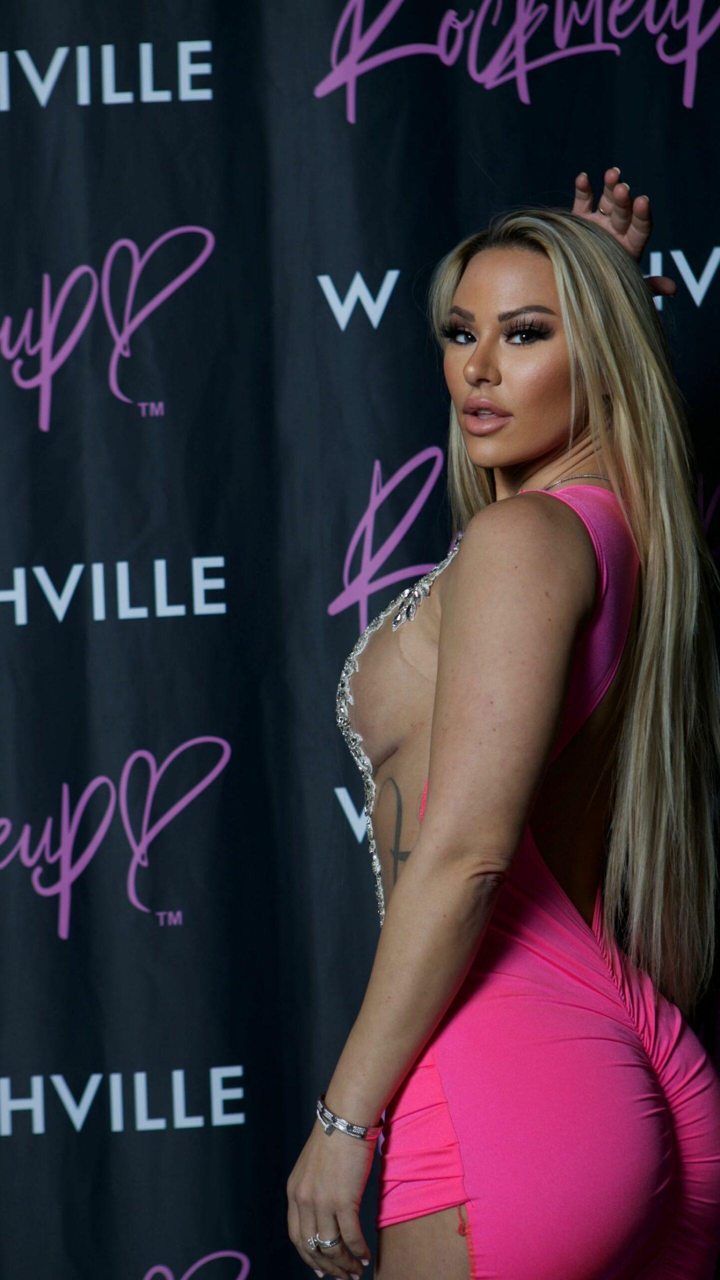 Kindly Myers poses in a see-through dress