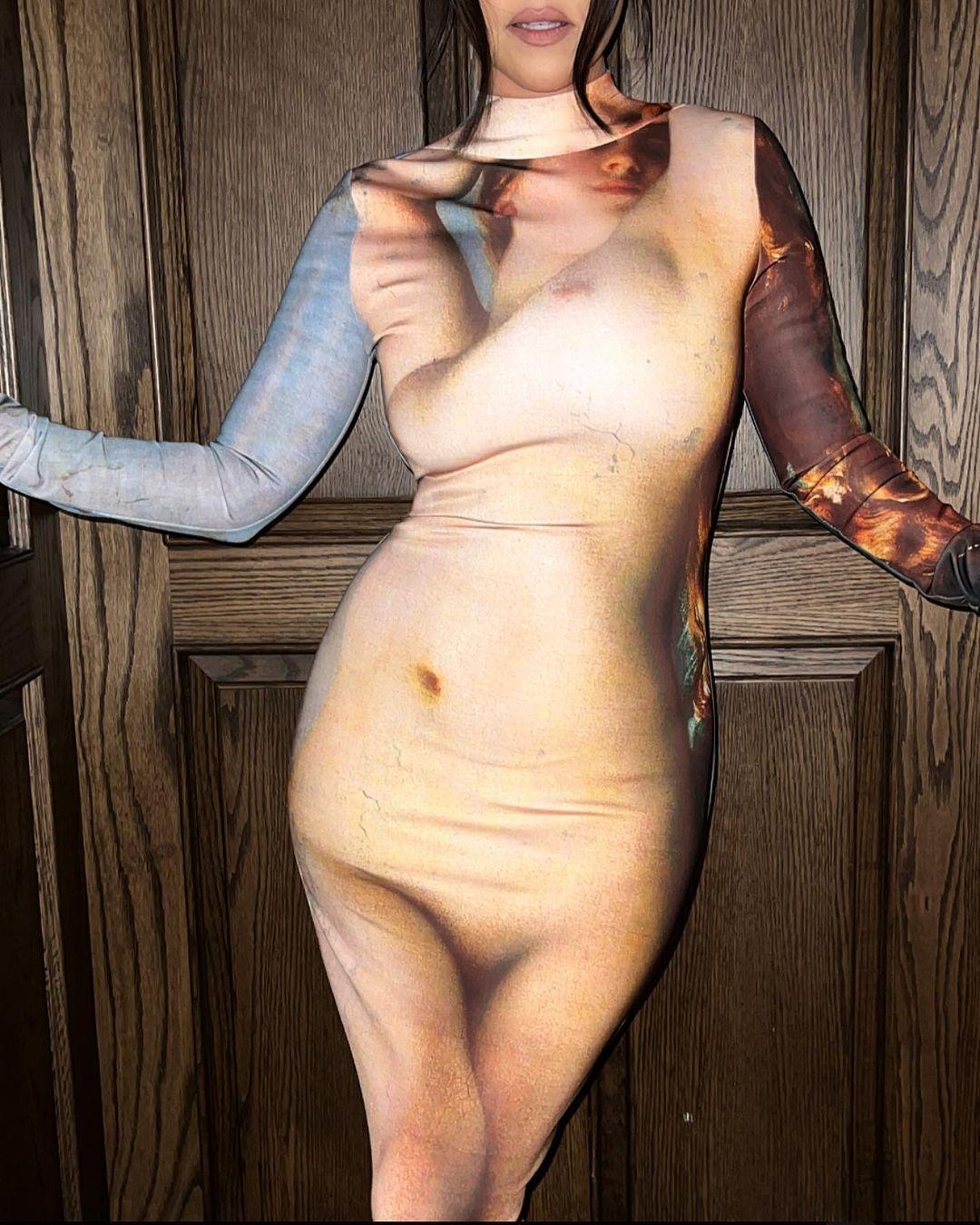 Kourtney Kardashian wears illusion naked dress