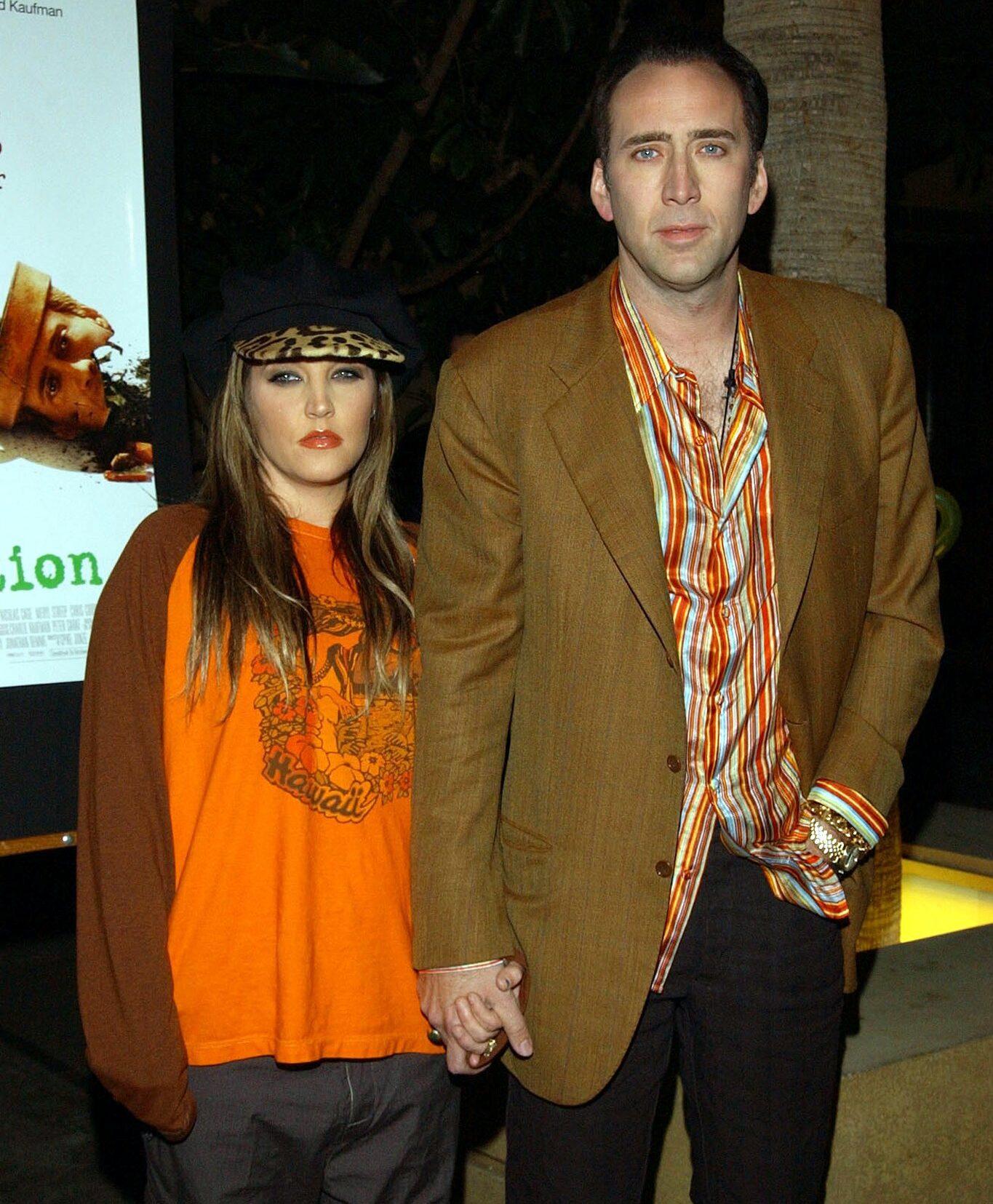 Lisa Marie Presley and Nicolas Cage arrive before American Cinematheque presents a sneak peek screening of "Adaptation," Saturday November 23, 2002 in Los Angeles, California.