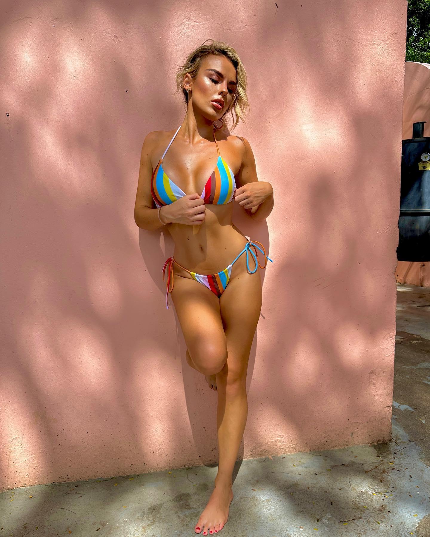 Tallia Storm poses in a tiny striped bikini