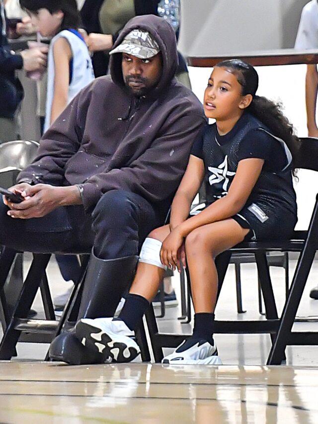 Kanye West with Daughter North West at a basketball game