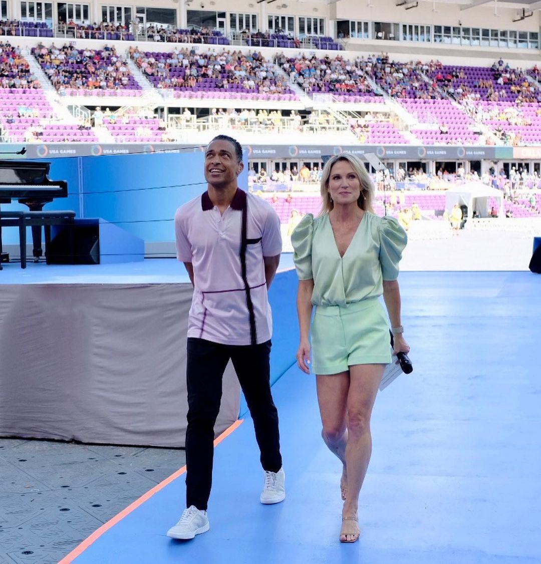 T.J. Holmes & Amy Robach walking together