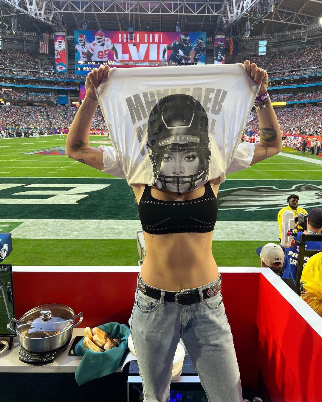 Cara Delevingne flaunts support for Rihanna at Super Bowl