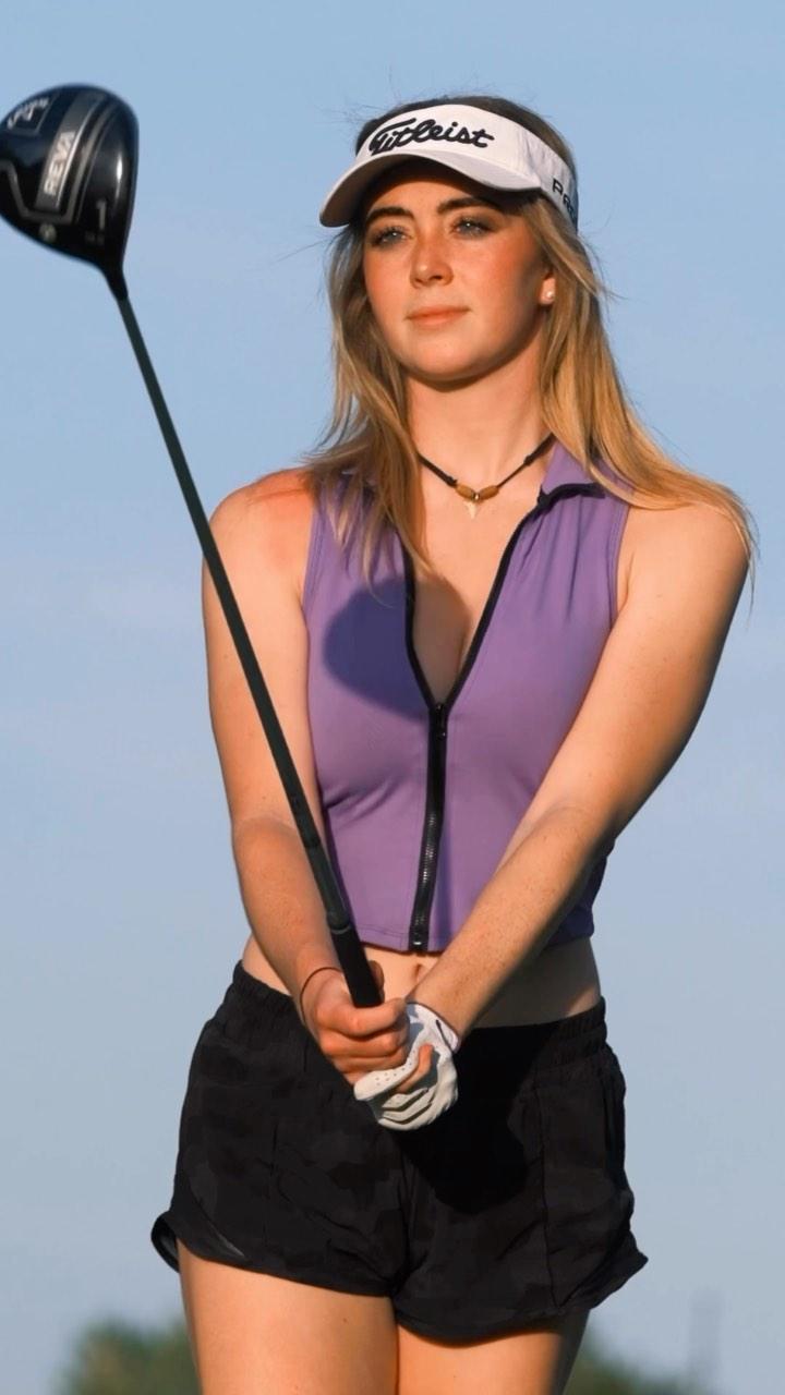 Grace Charis goes golfing in a braless crop top