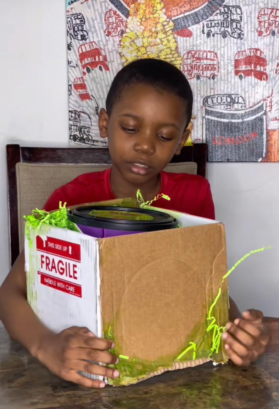Corn Kid opening a special package