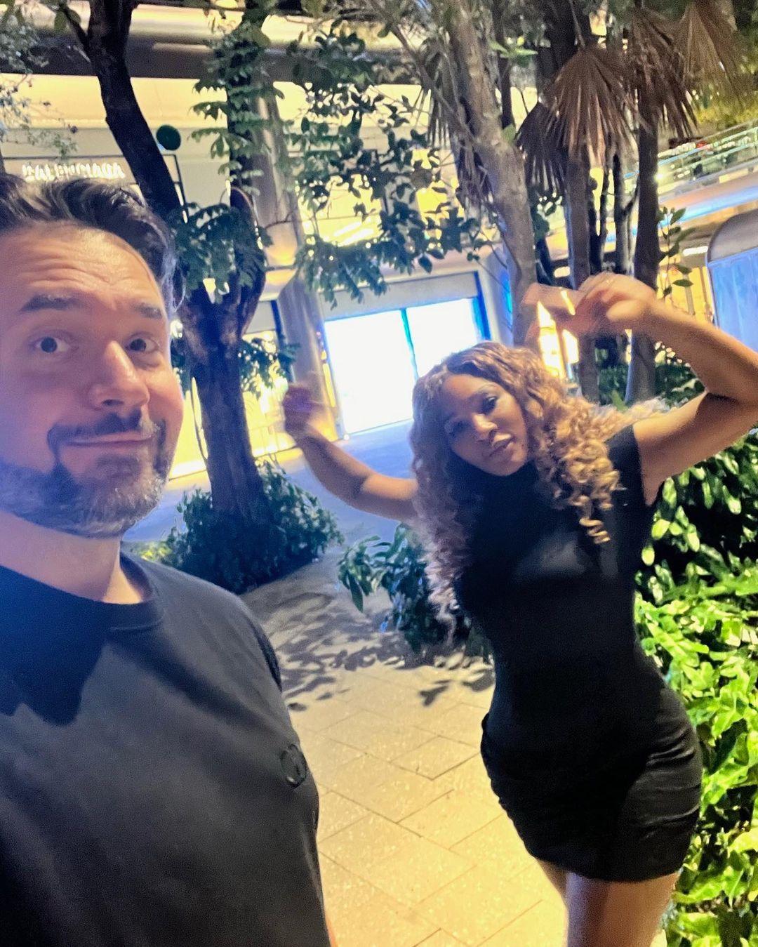 Serena Williams enjoys a night out with her husband in stunning black mini dresses