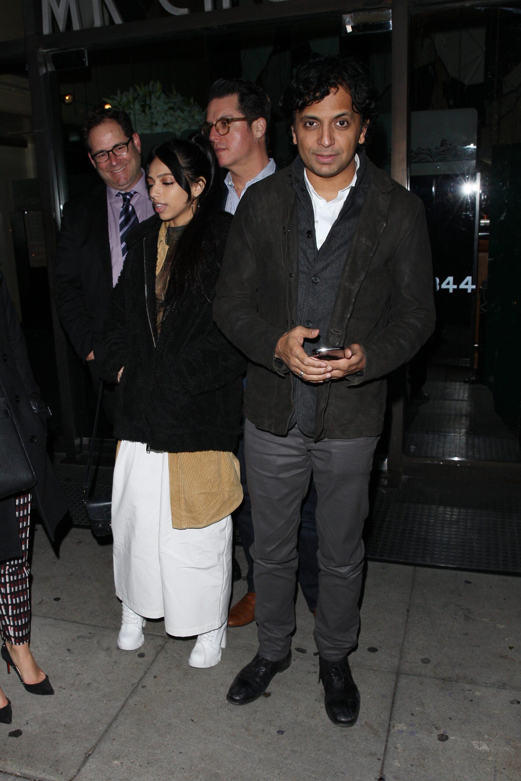 Filmmaker M Night Shyamalan is seen having dinner with his daughter at Mr Chow restaurant