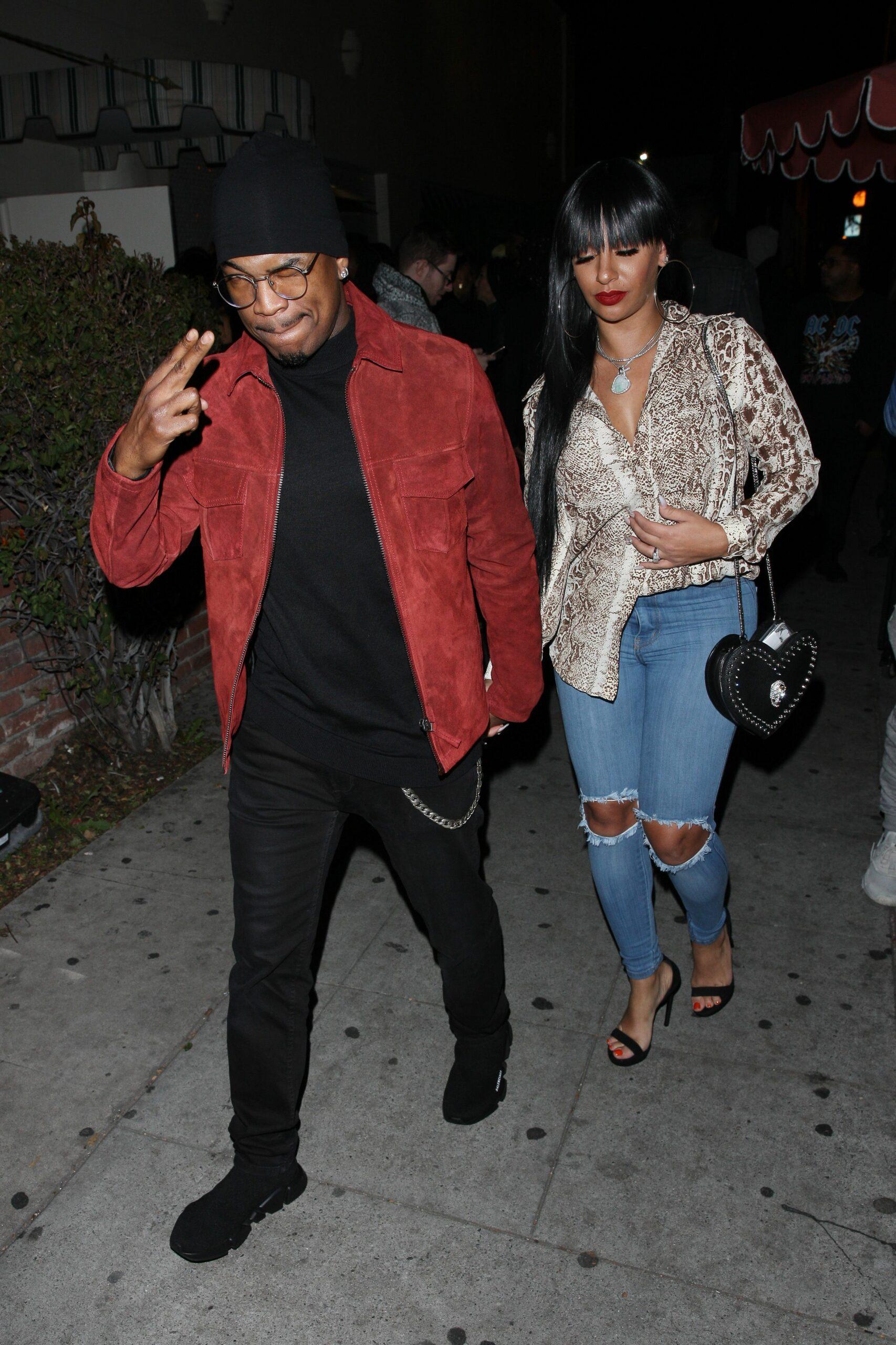 Ne-Yo and Crystal Renay are seen heading to a Grammy party at the Delilah club
