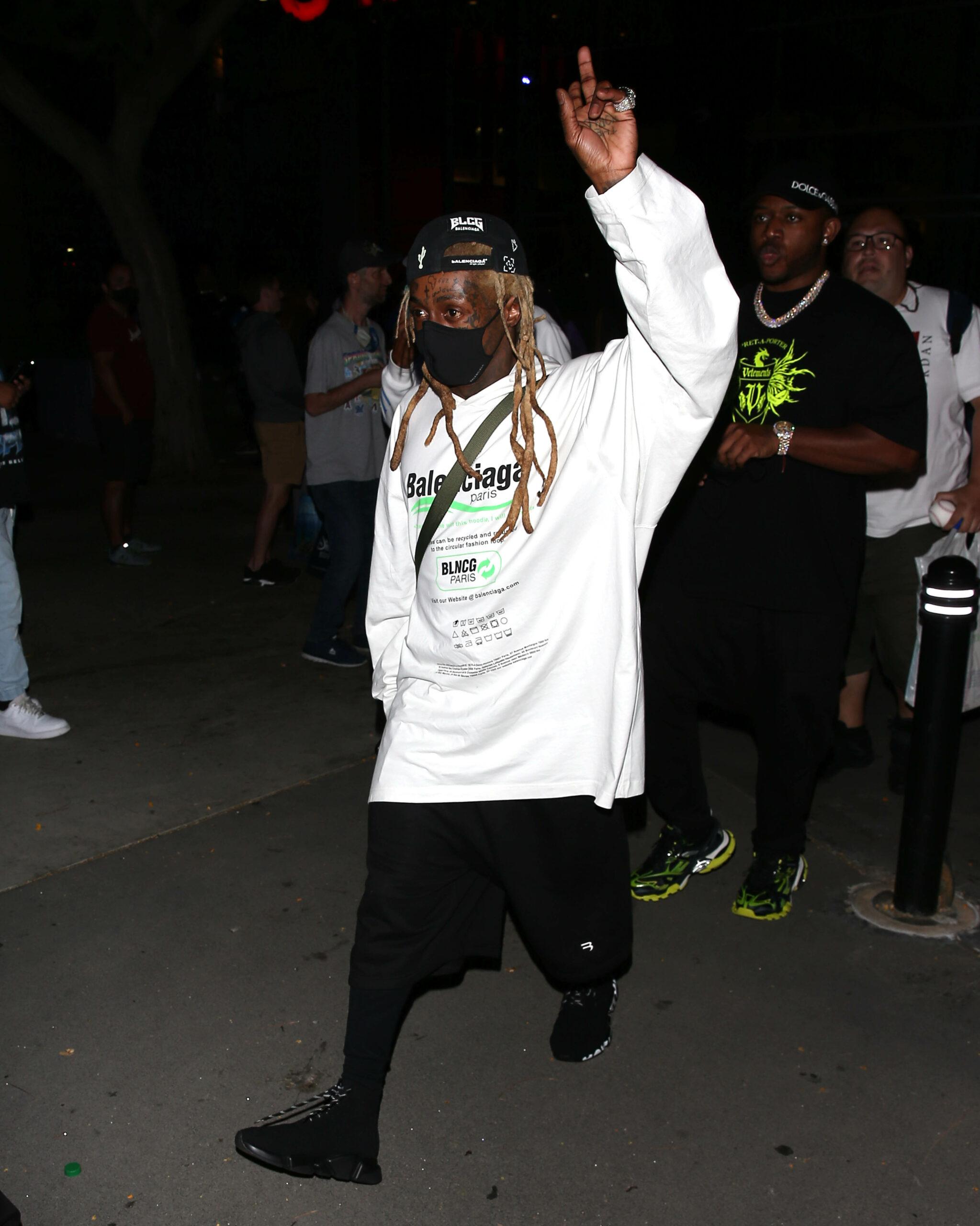 Lil Wayne was seen leaving the Lakers Vs Clippers NBA game at Staples Center in Los Angeles CA