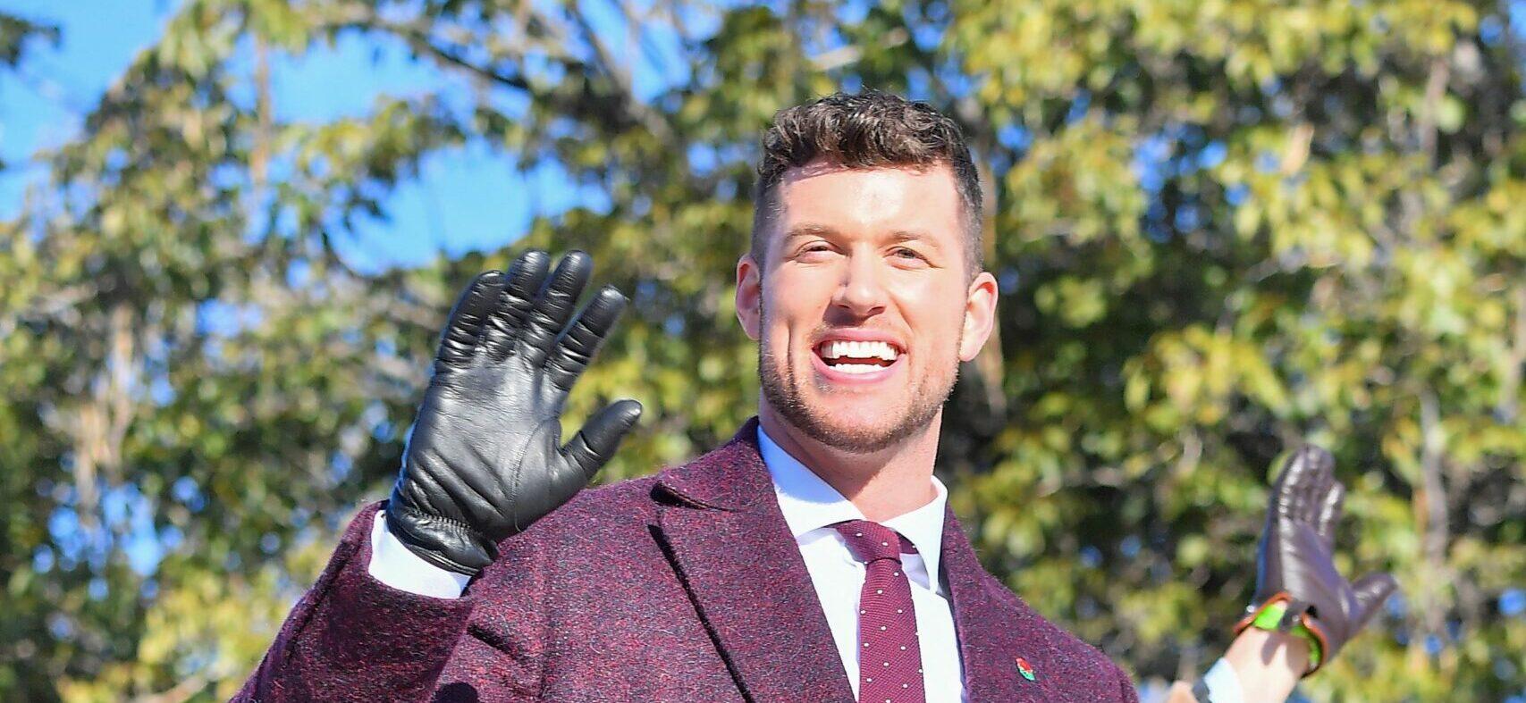 Bachelor Clayton Echard is all smiles while on a parade float in the 2022 Rose Parade in Pasadena Ca