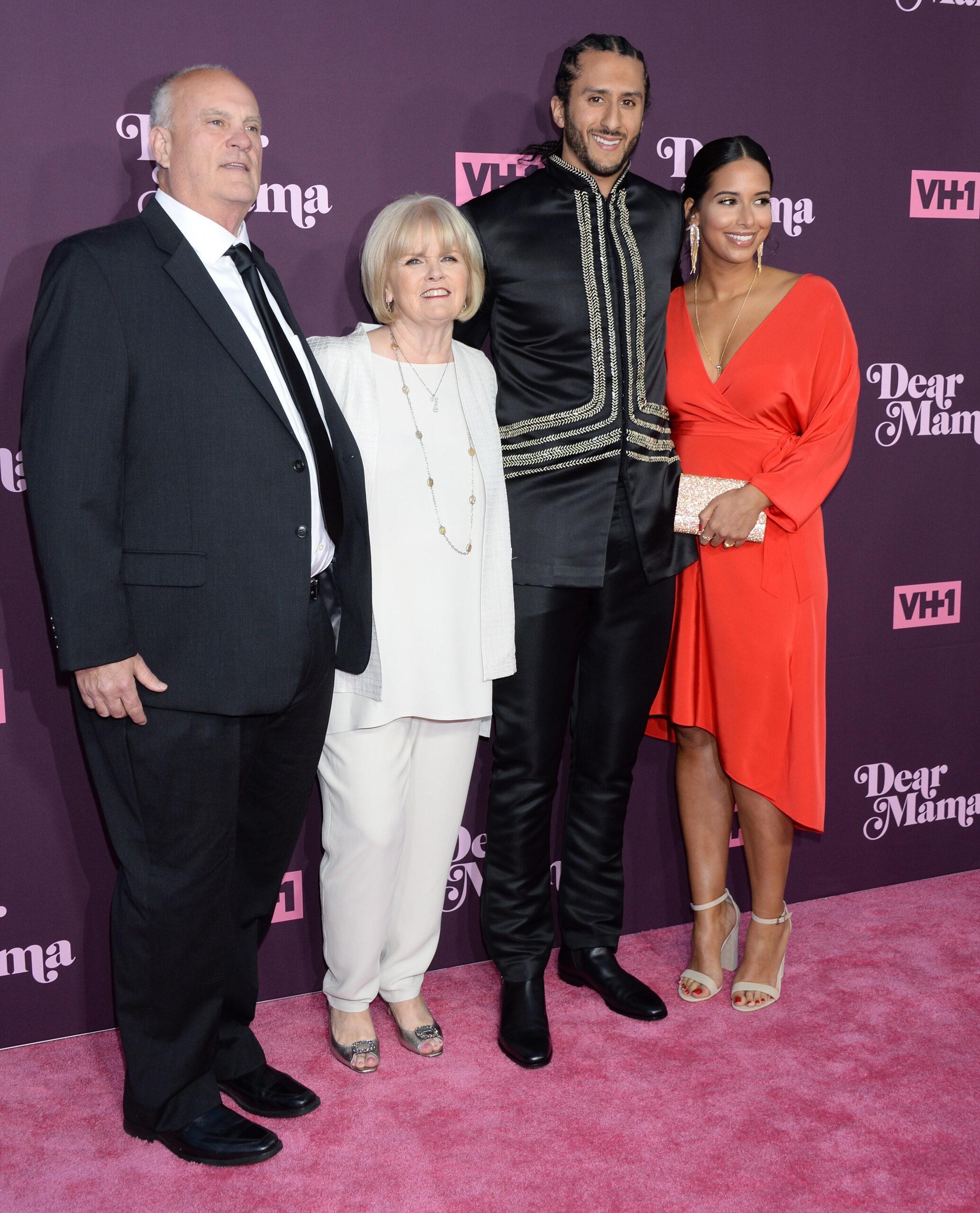 Colin Kaepernick with his parents and girlfriend