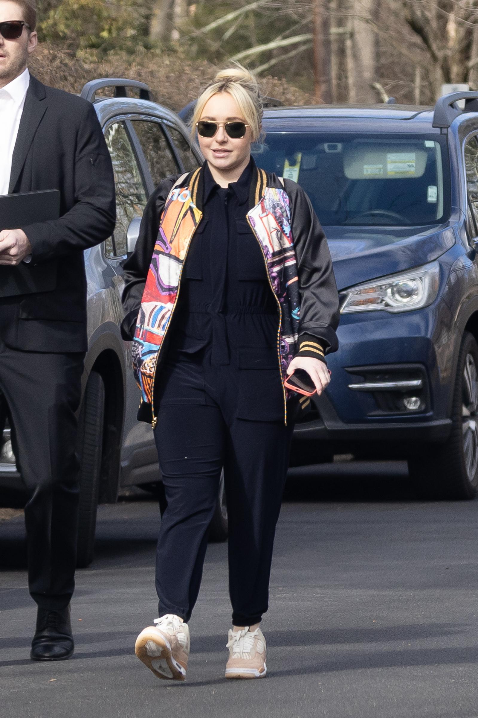 Hayden Panettiere arrives at her younger brother Jansen's celebration of life event in their hometown of Palisades, New York, with on/off boyfriend Brian Hickerson.