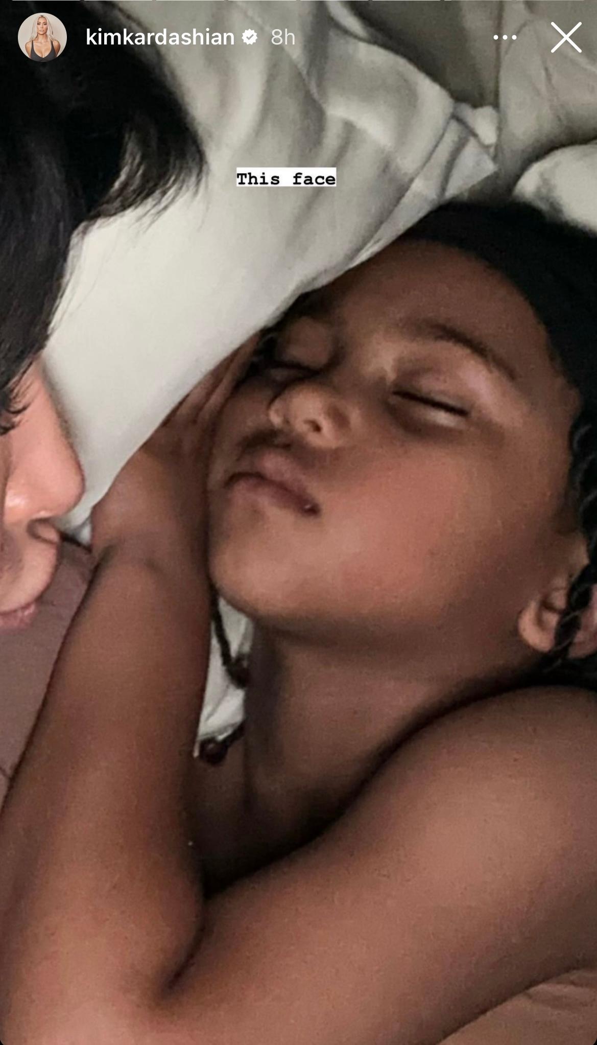 Kim Kardashian and son Saint sleeping in bed