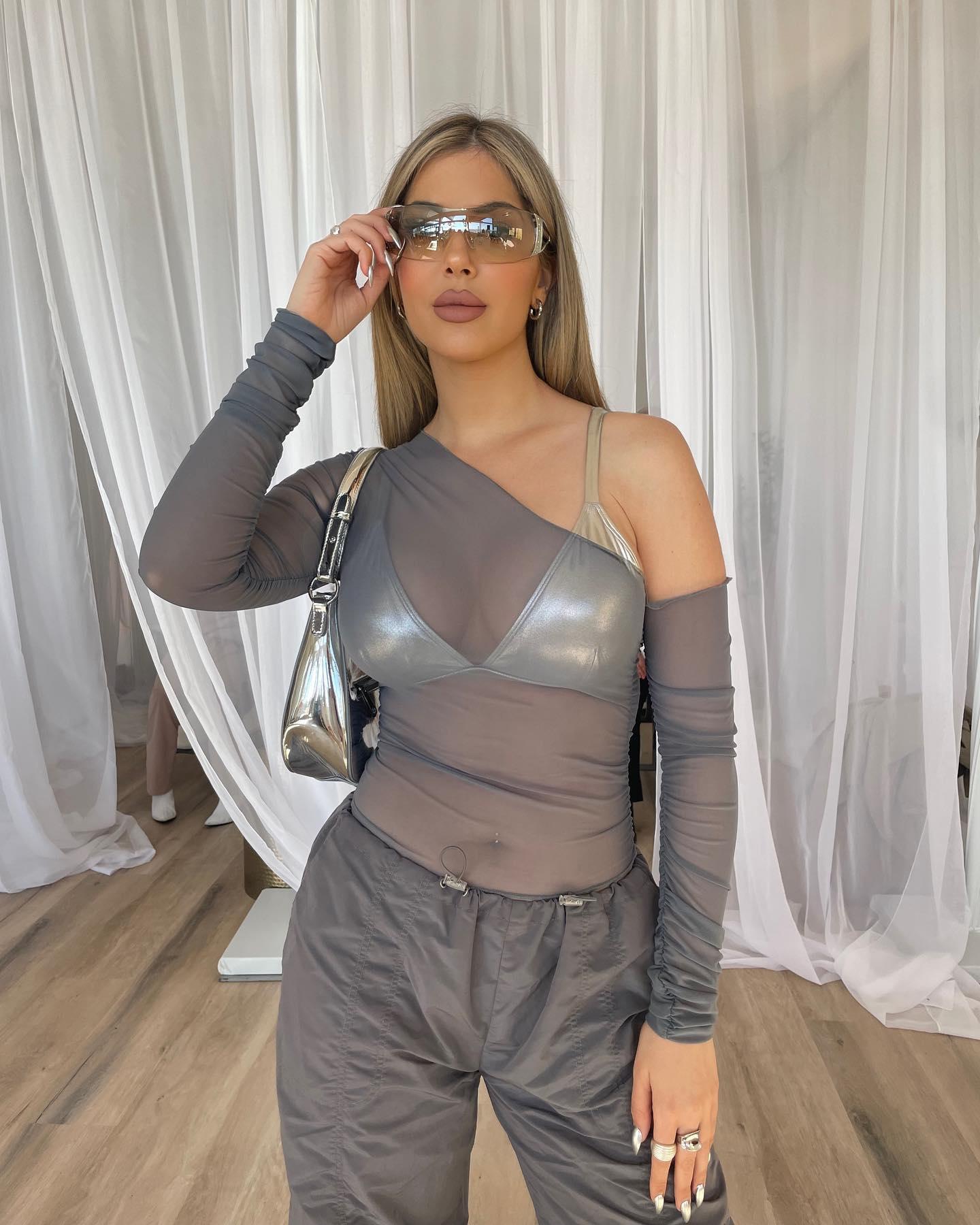 Sophia Pierson gives Y2K vibes in a see-through shirt
