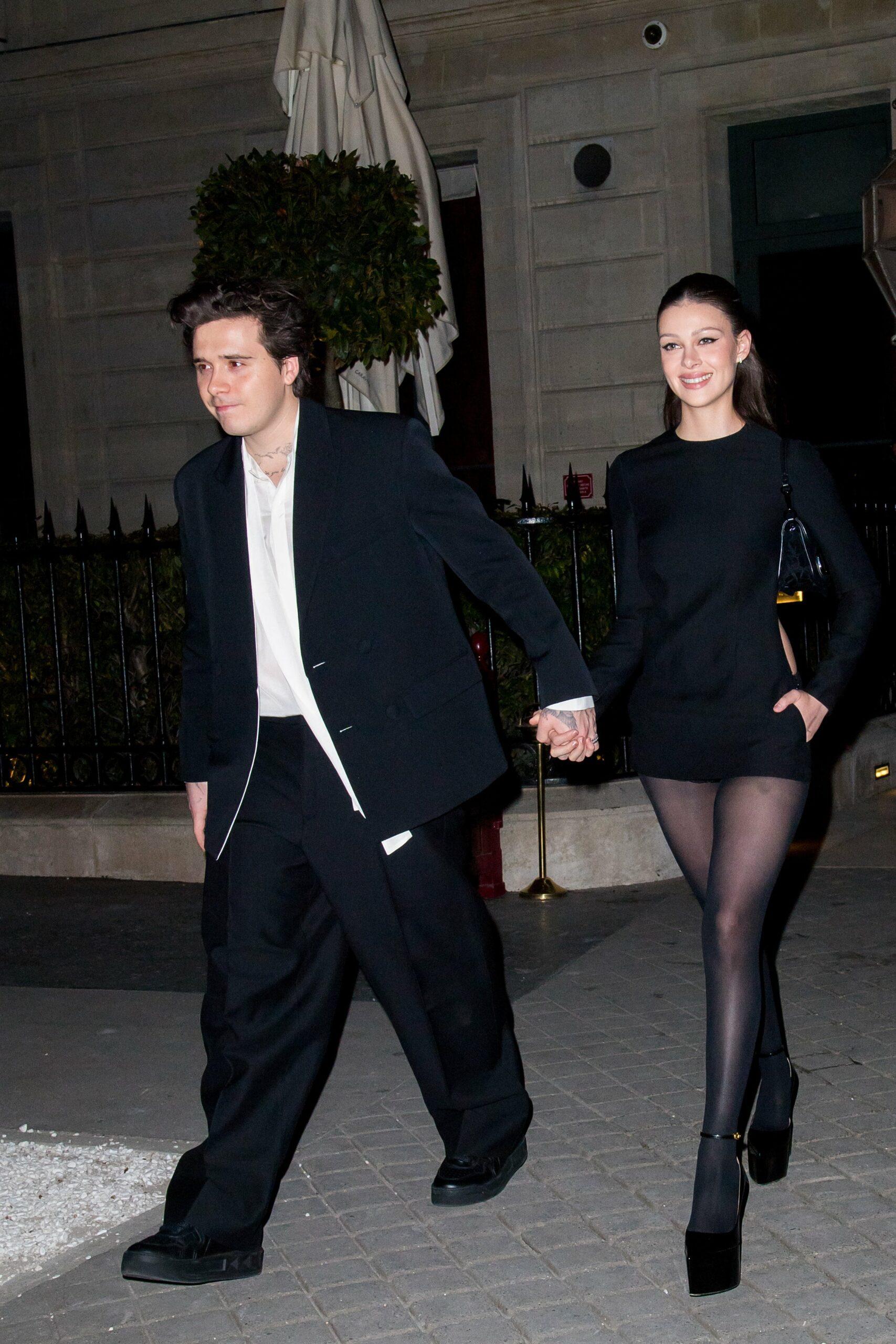 Brooklyn Beckham and Nicola Peltz are seen in Paris