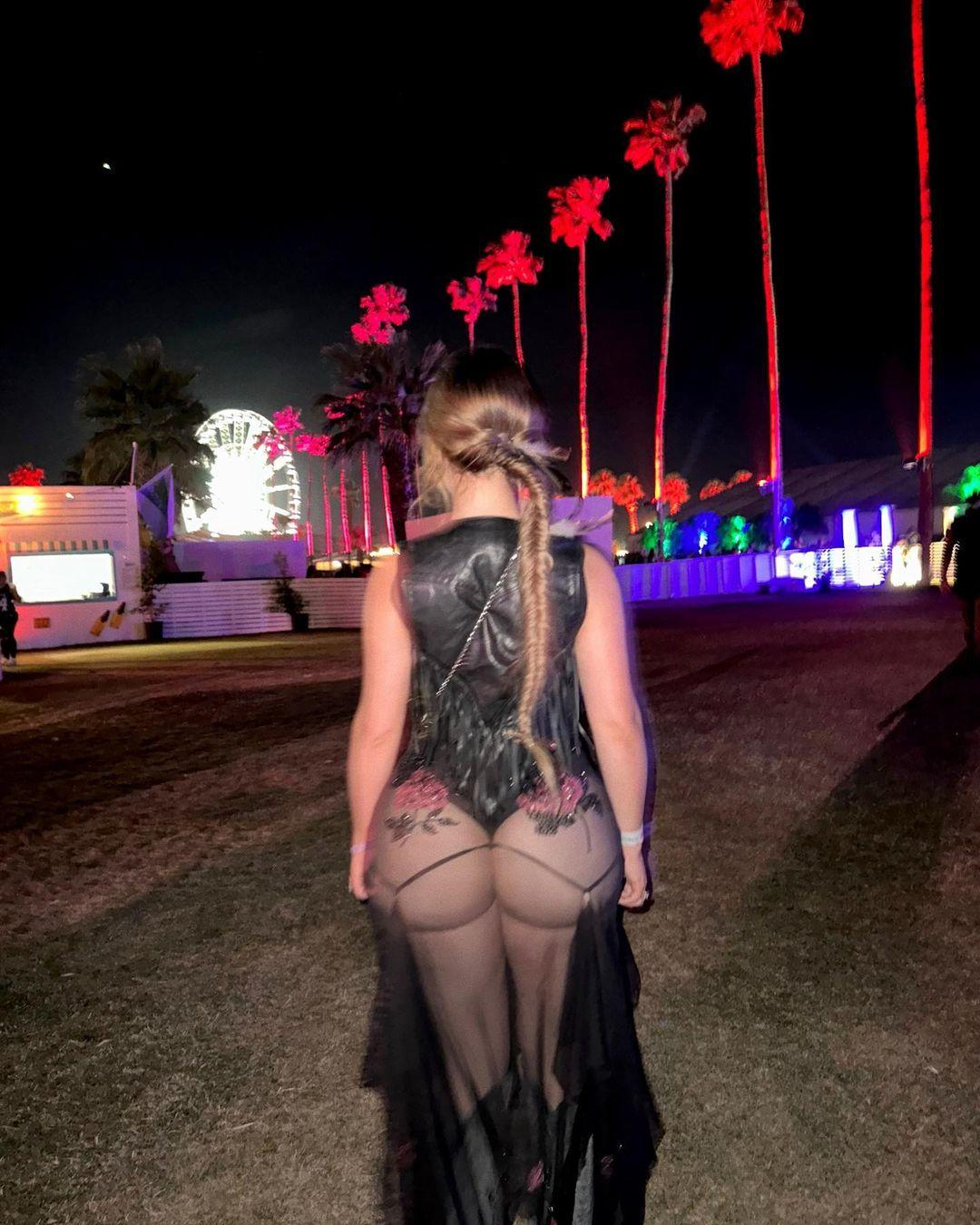 Demi Rose posing for the camera at Coachella.