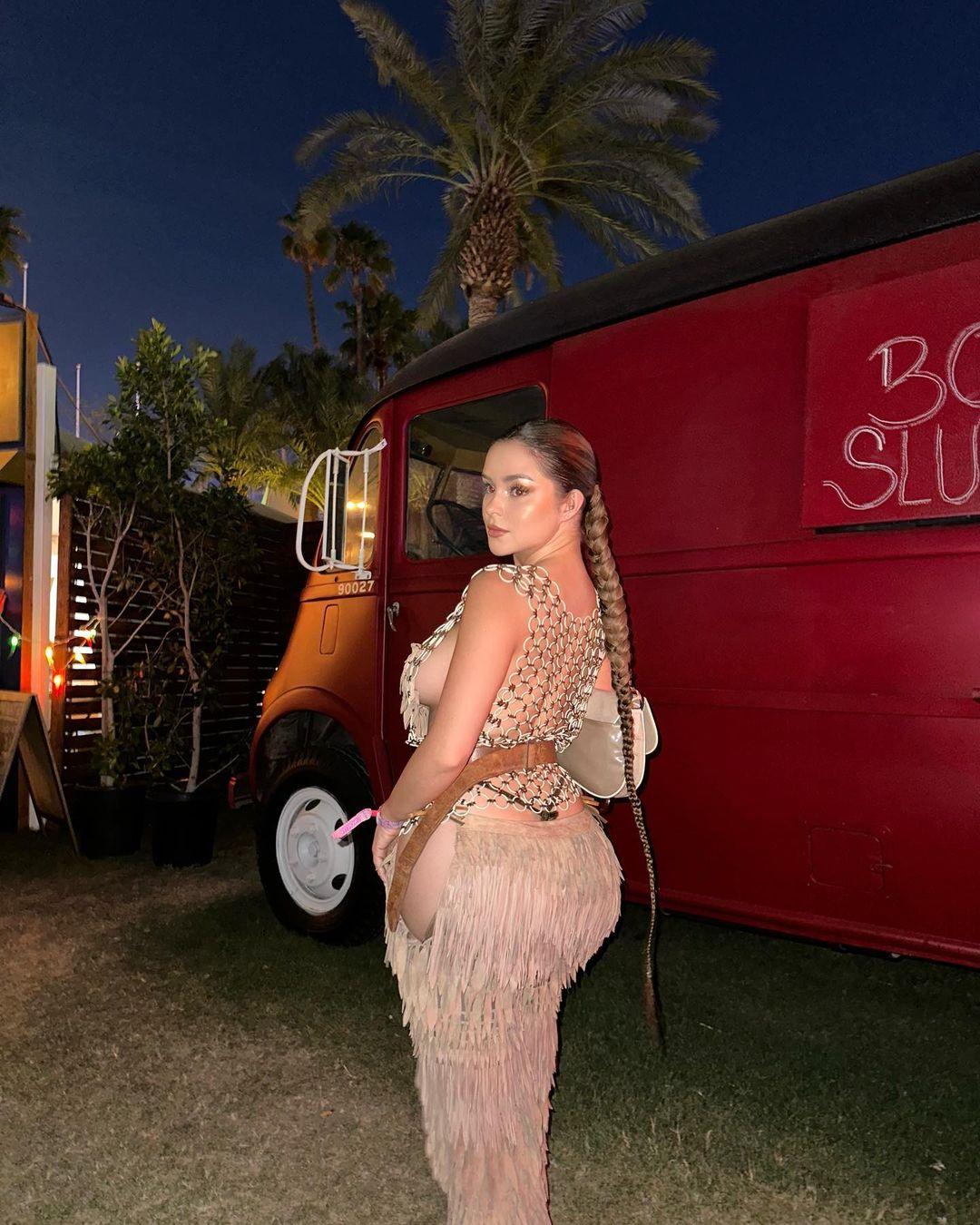 Demi Rose posing for the camera.