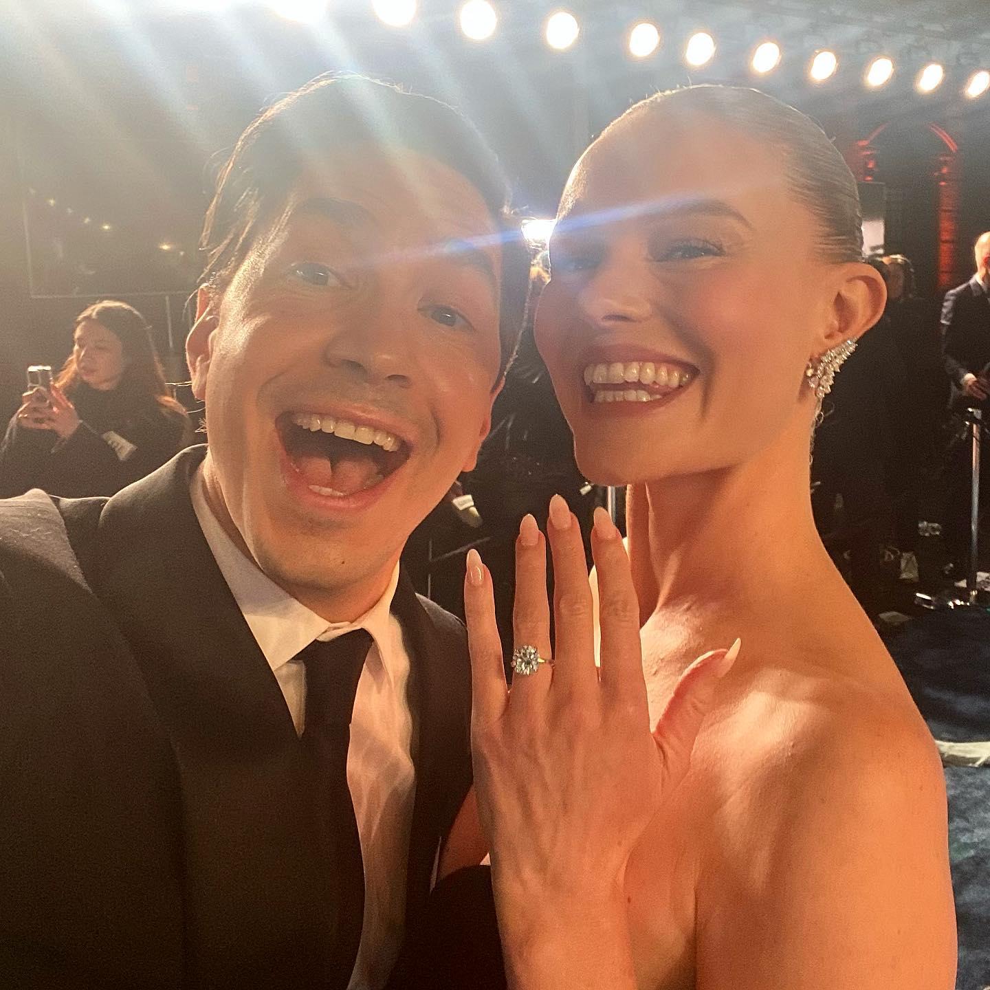 Justin Long poses with Kate Bosworth