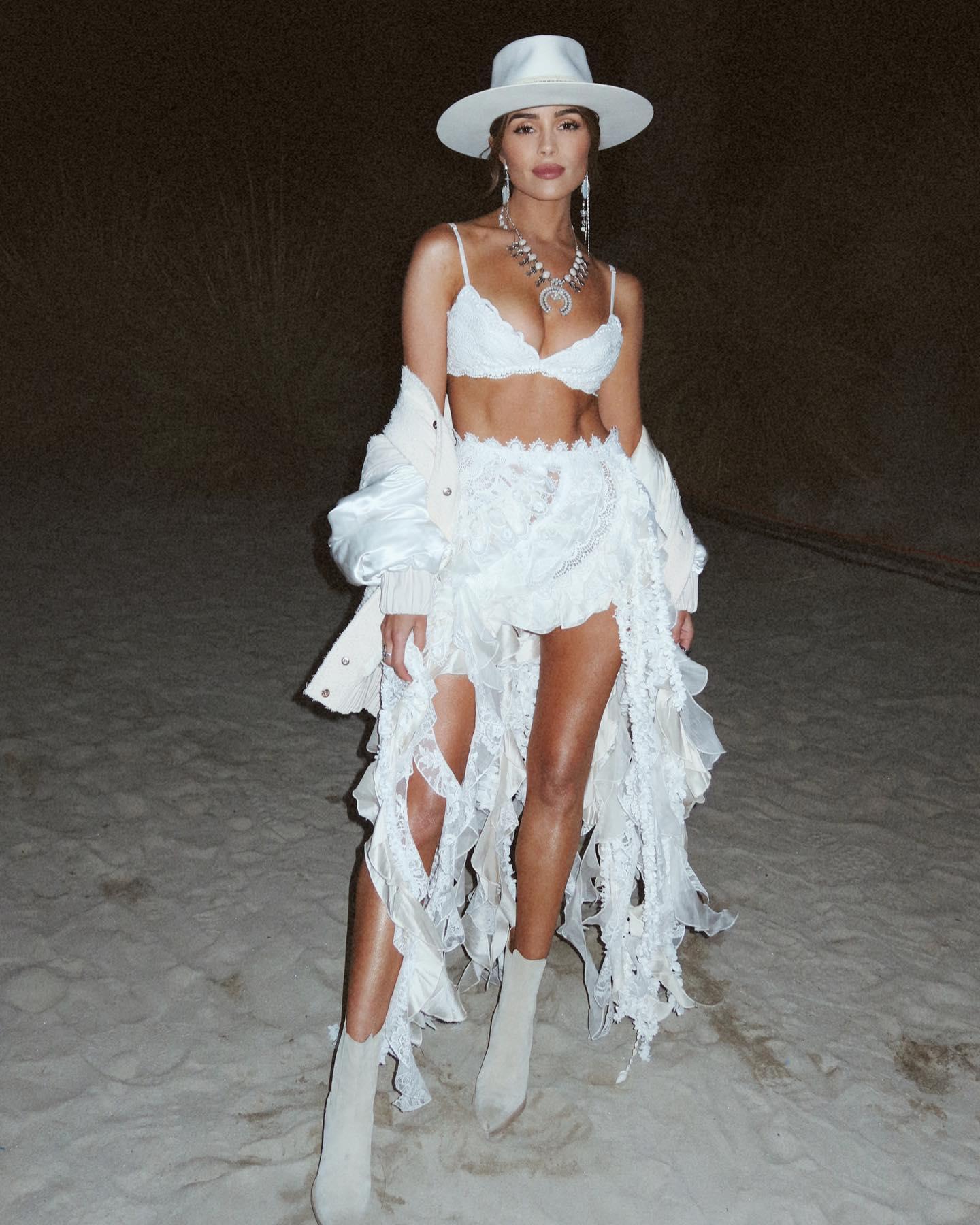 Olivia Culpo Is ‘Giving Bride-Cella’ At Coachella In White Lingerie