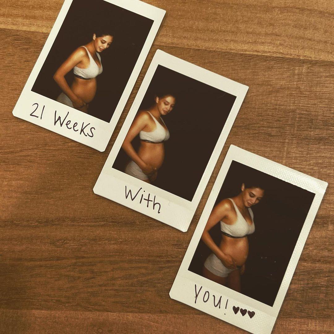 April Marie Documents Pregnancy Journey With THESE Cute Polaroids