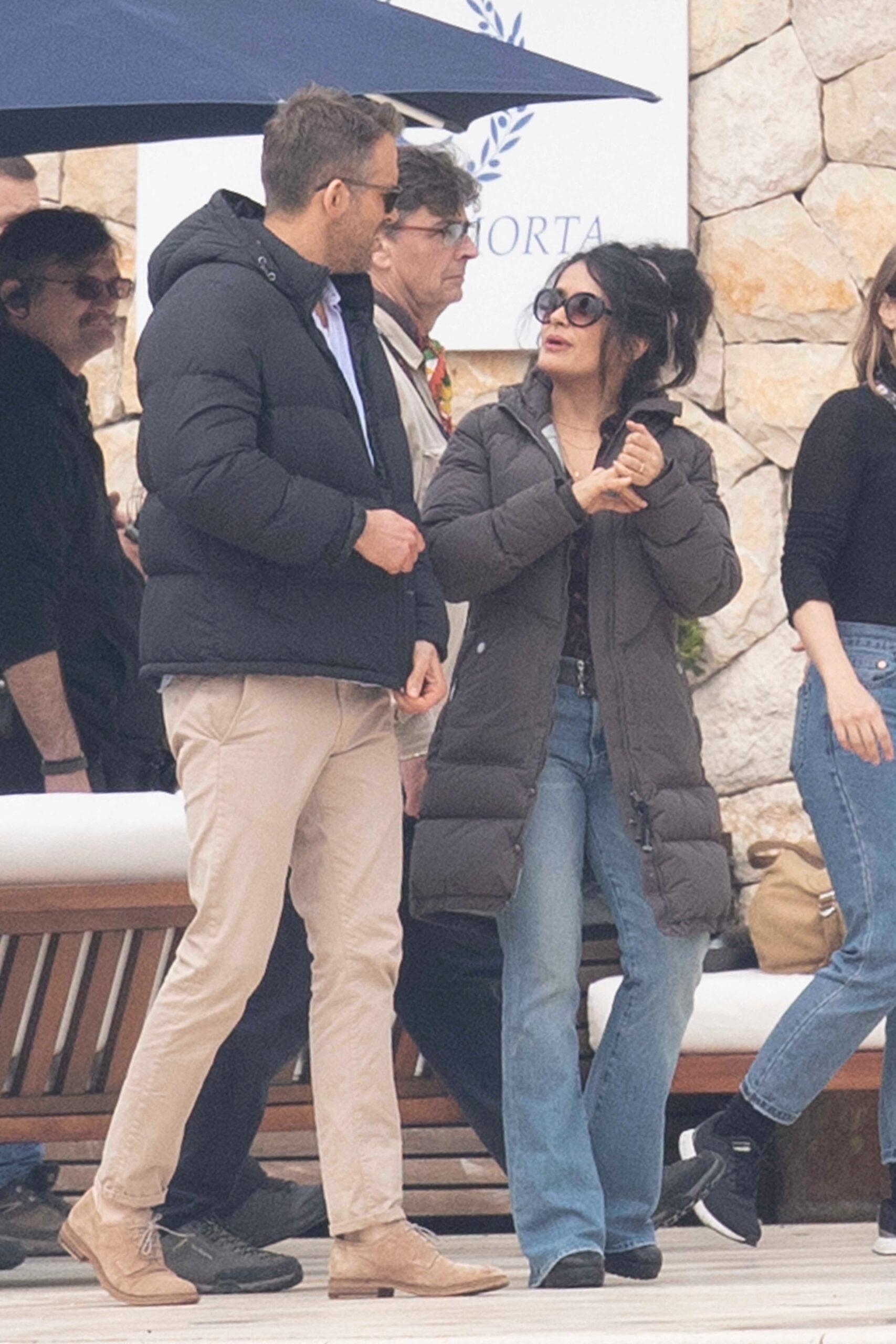 Ryan Reynolds and Salma Hayek have an animated chat between takes as they shoot The Hitman's Wife's Bodyguard in Croatia.