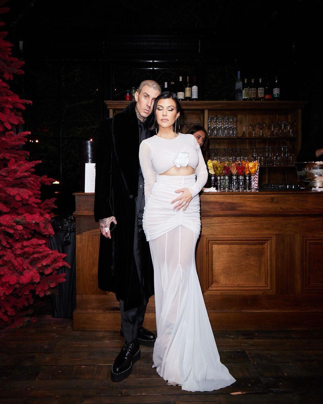 Portrait of the lovely couple Travis Barker and Kourtney Kardashian