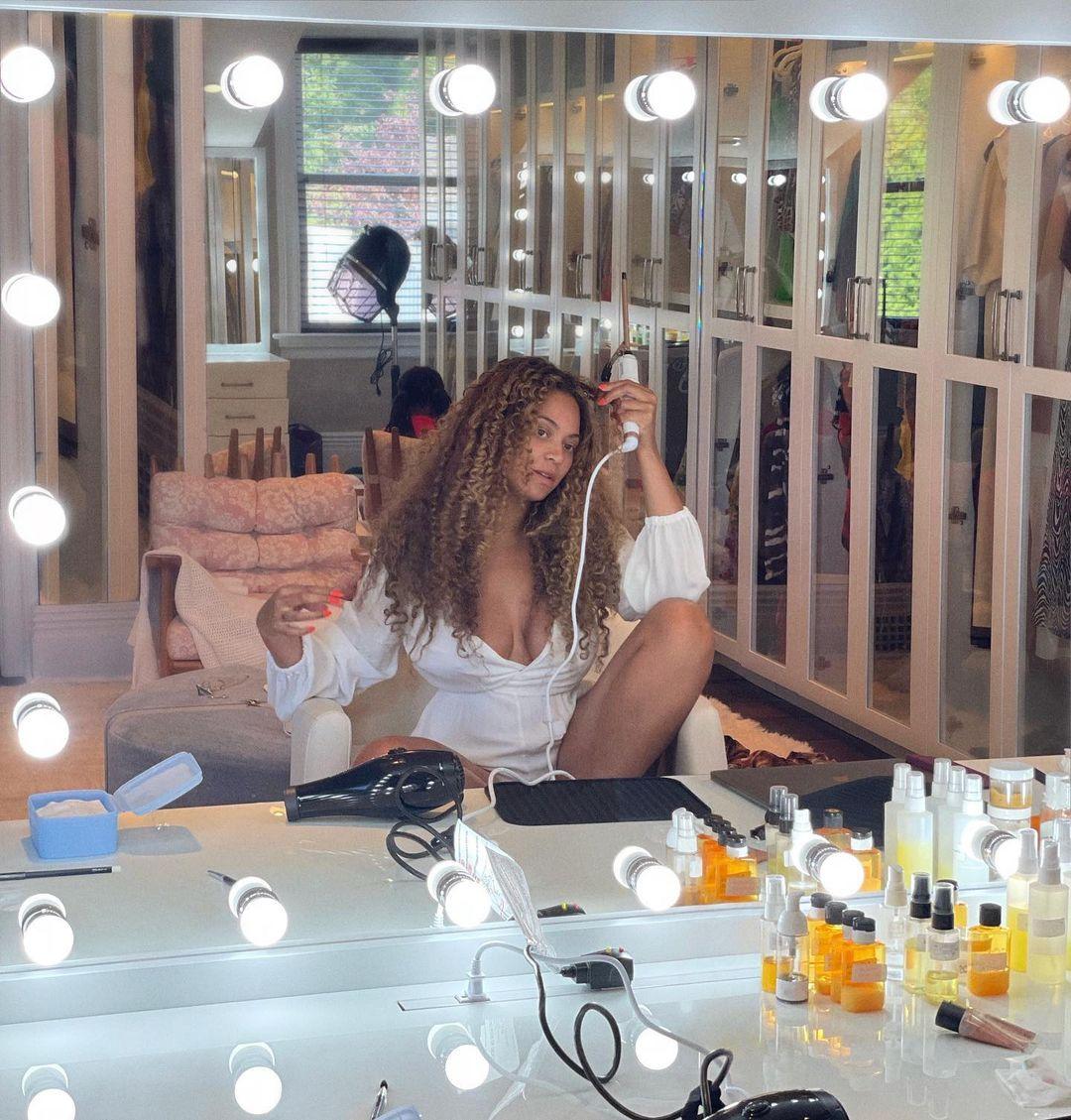 Beyonce teases hair venture in cryptic post, flaunting natural hair