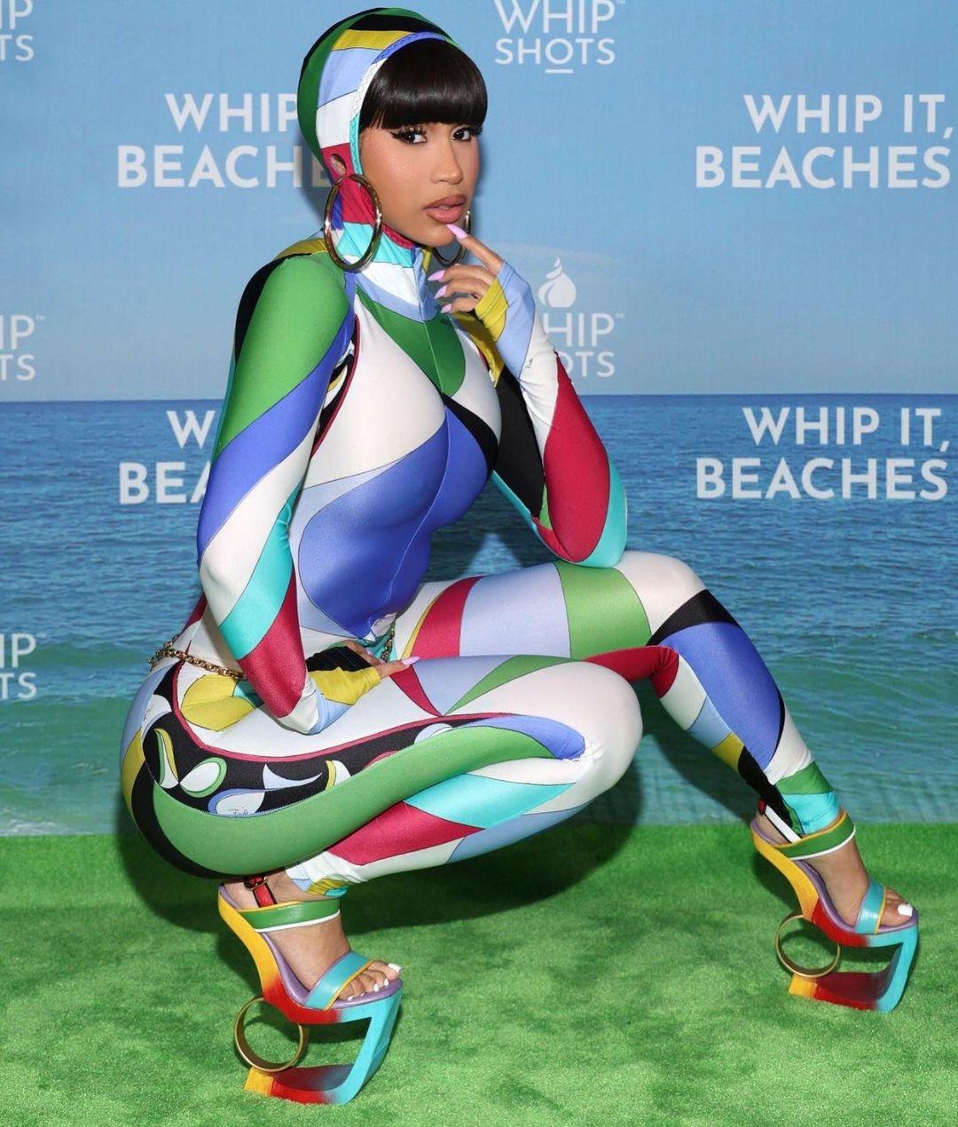 Cardi B turns heads in daring colorful outfit