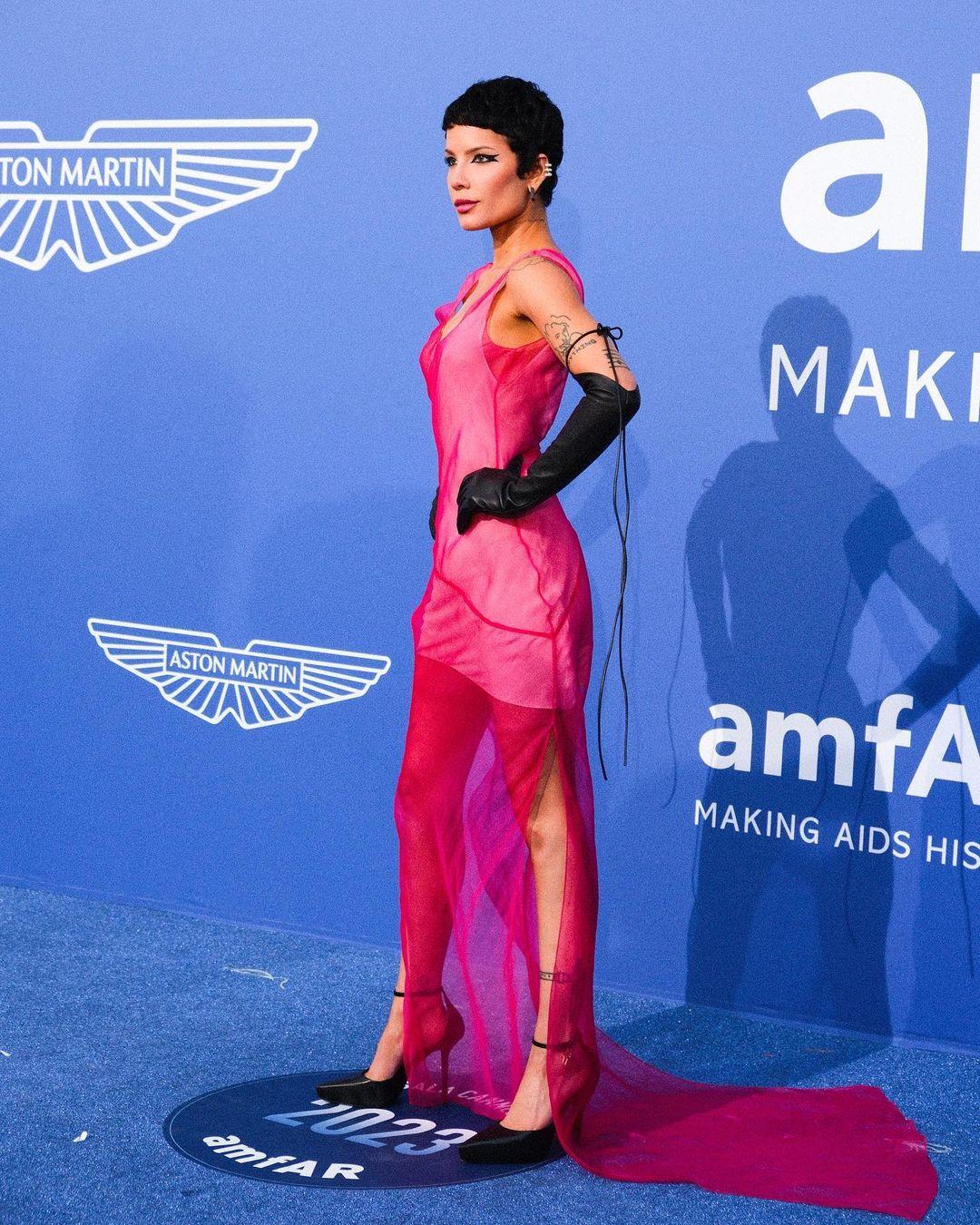 Halsey in neon pink dress at amfAR