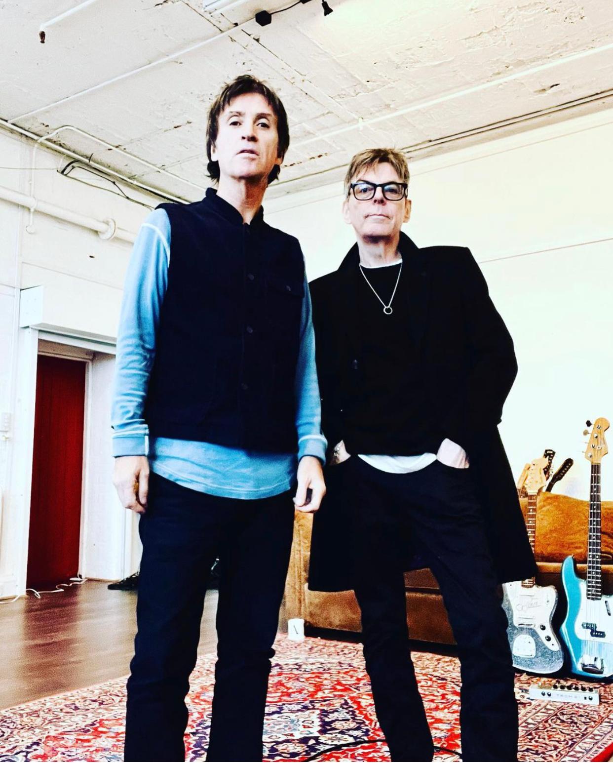 Johnny Marr and Andy Rourke in living room
