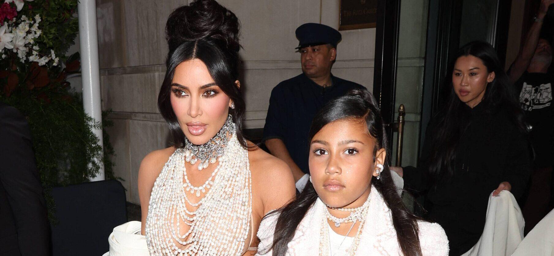 Kim Kardashian Stuns in Pearls with Daughter North West leaving the Ritz Hotel on there way to the Met Gala