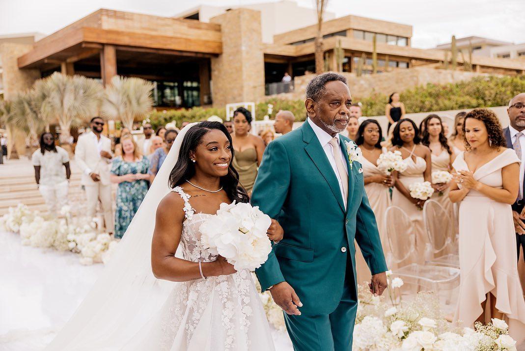 Simone Biles' father walks her down the aisle during wedding