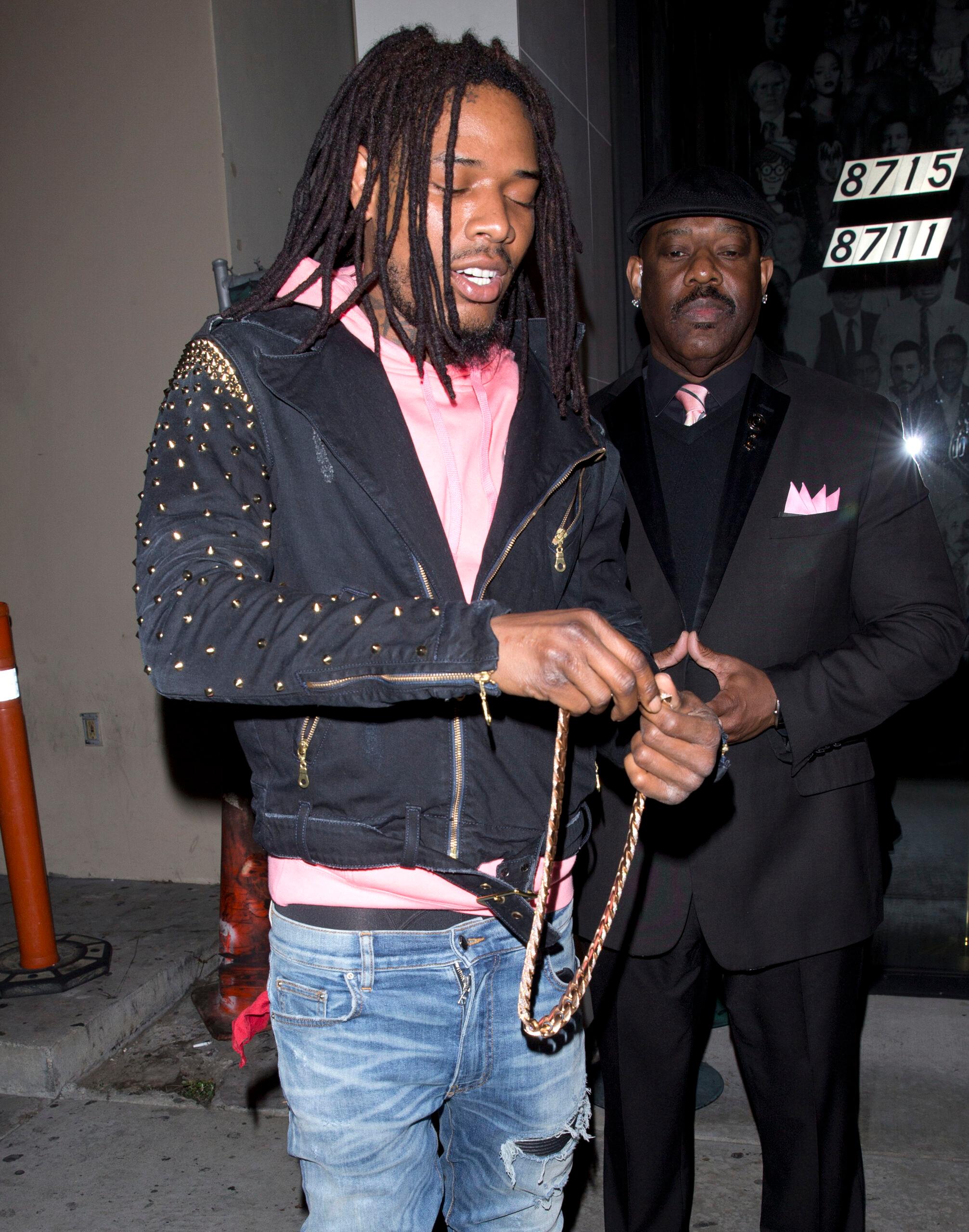 Rapper Fetty Wap was seen showing off his diamond encrusted Gold necklace as he was seen leaving dinner at apos Catch LA apos in West Hollywood CA