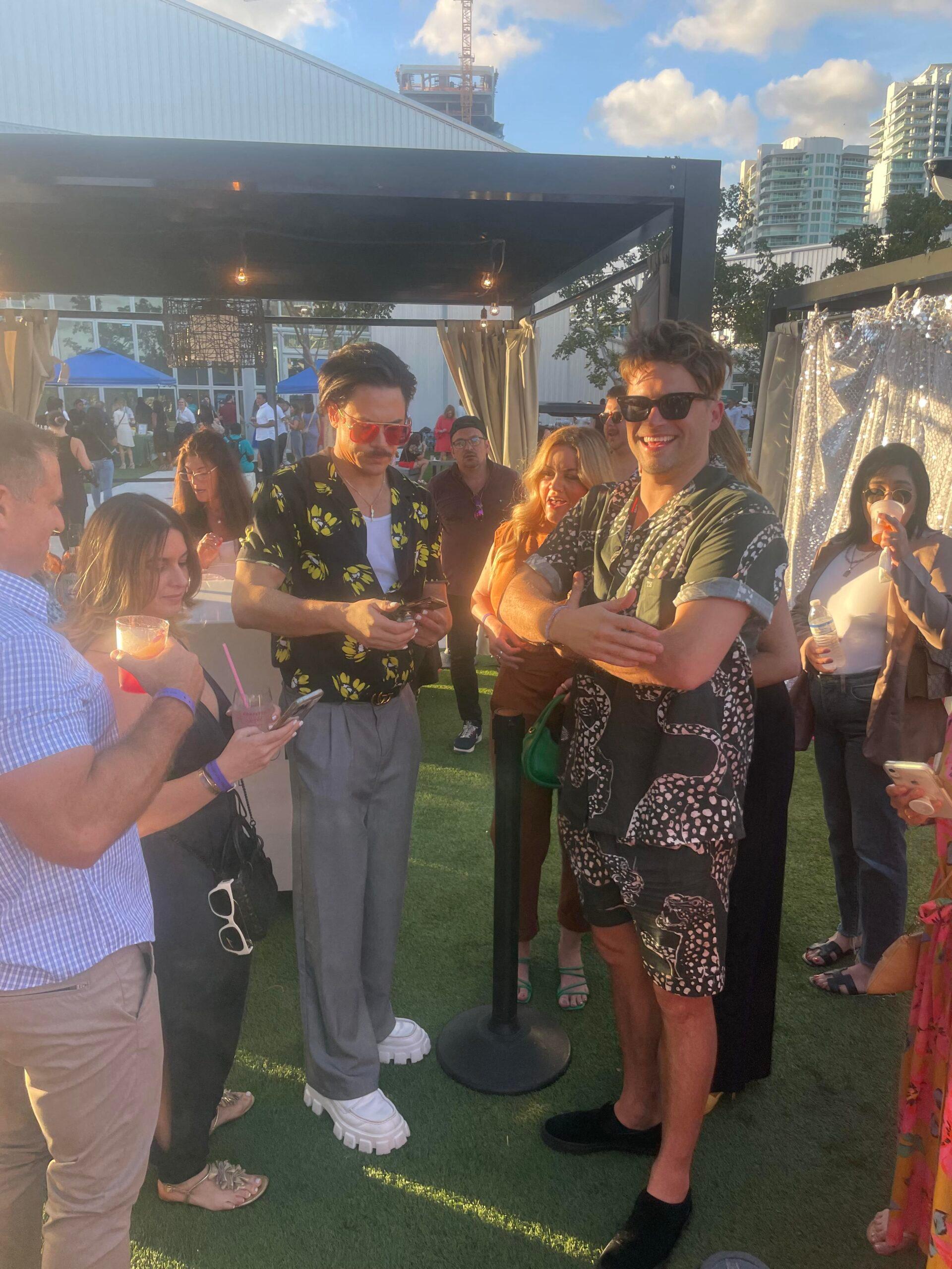 Tom Schwartz and Tom Sandoval make drinks for guests as they party at food and wine festival in Miami