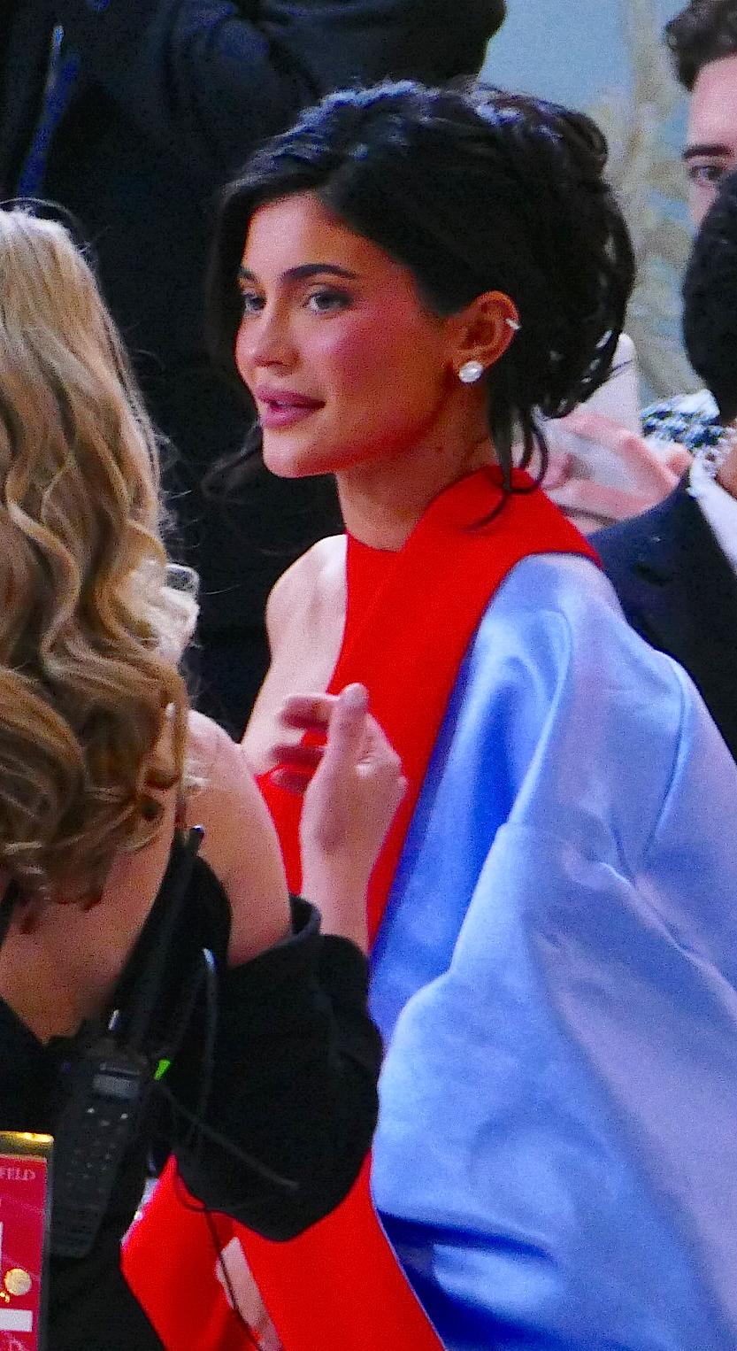 Kylie Jenner shows off her amazing flowing red dress as she stuns on the carpet during the Met Gala NYC