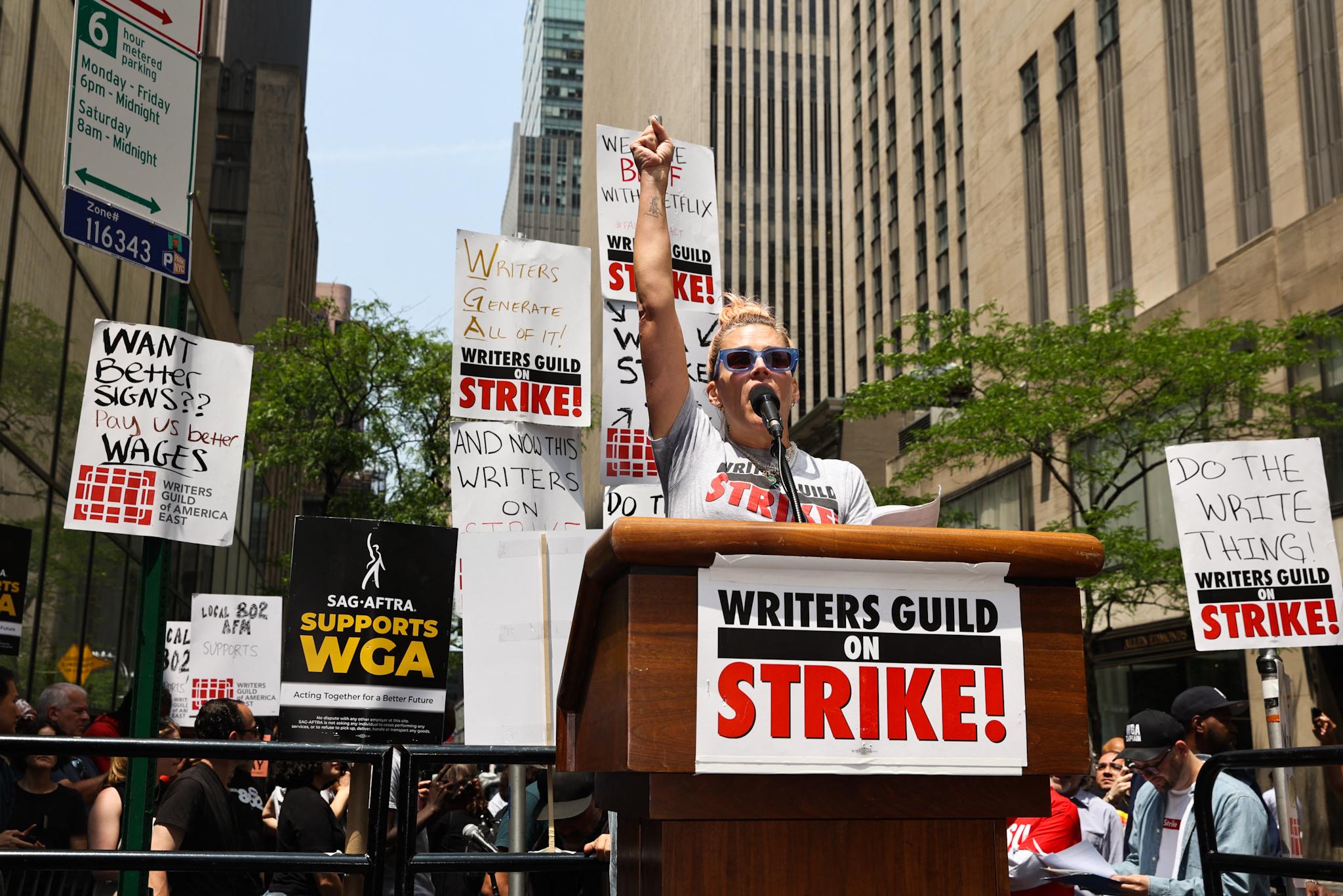 Actress Busy Phillips seen giving a speech at the WGA Writers Strike today in Rockefeller Center in New York City