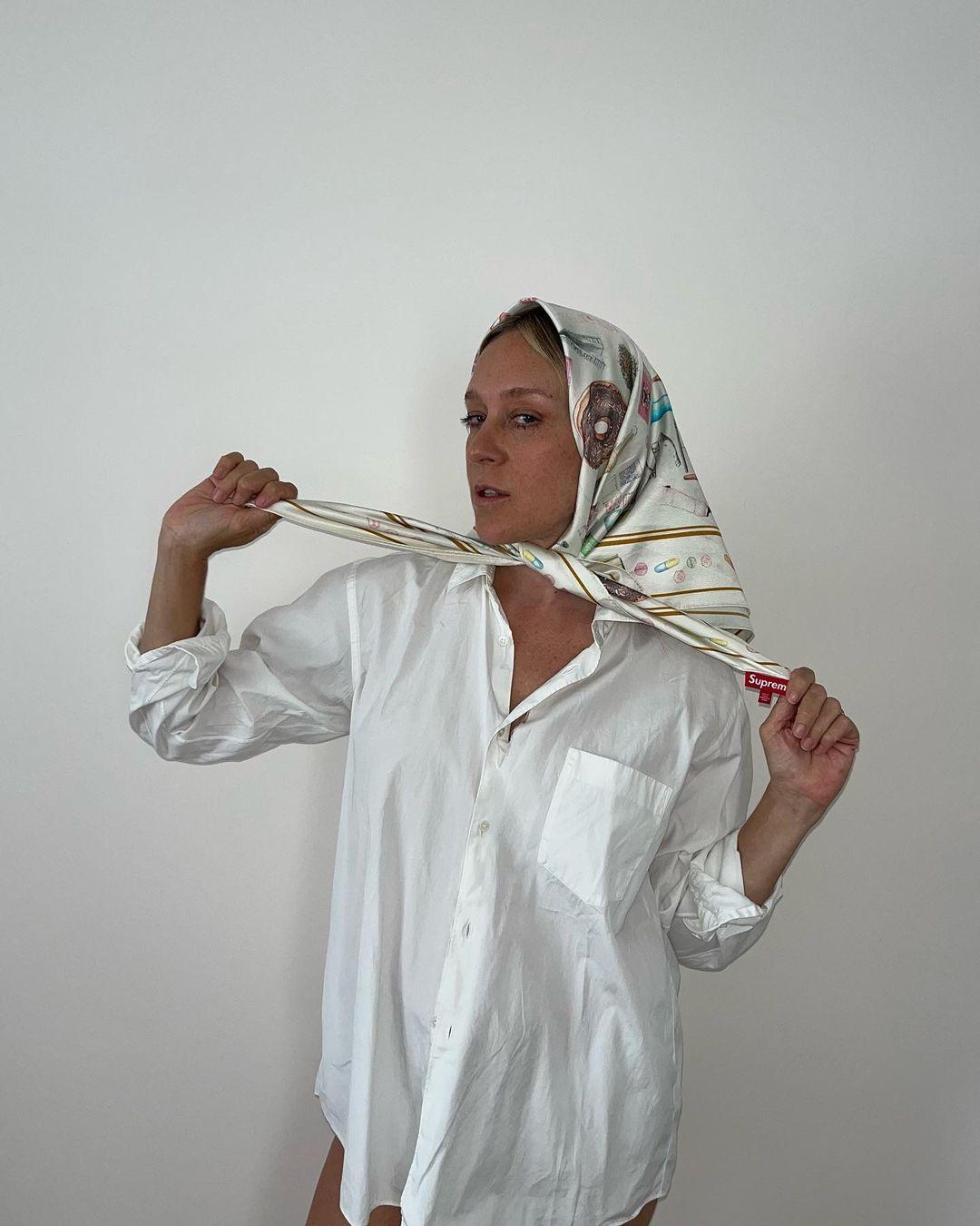 Chloë Sevigny drapes on an Aurel Schmidt scarf