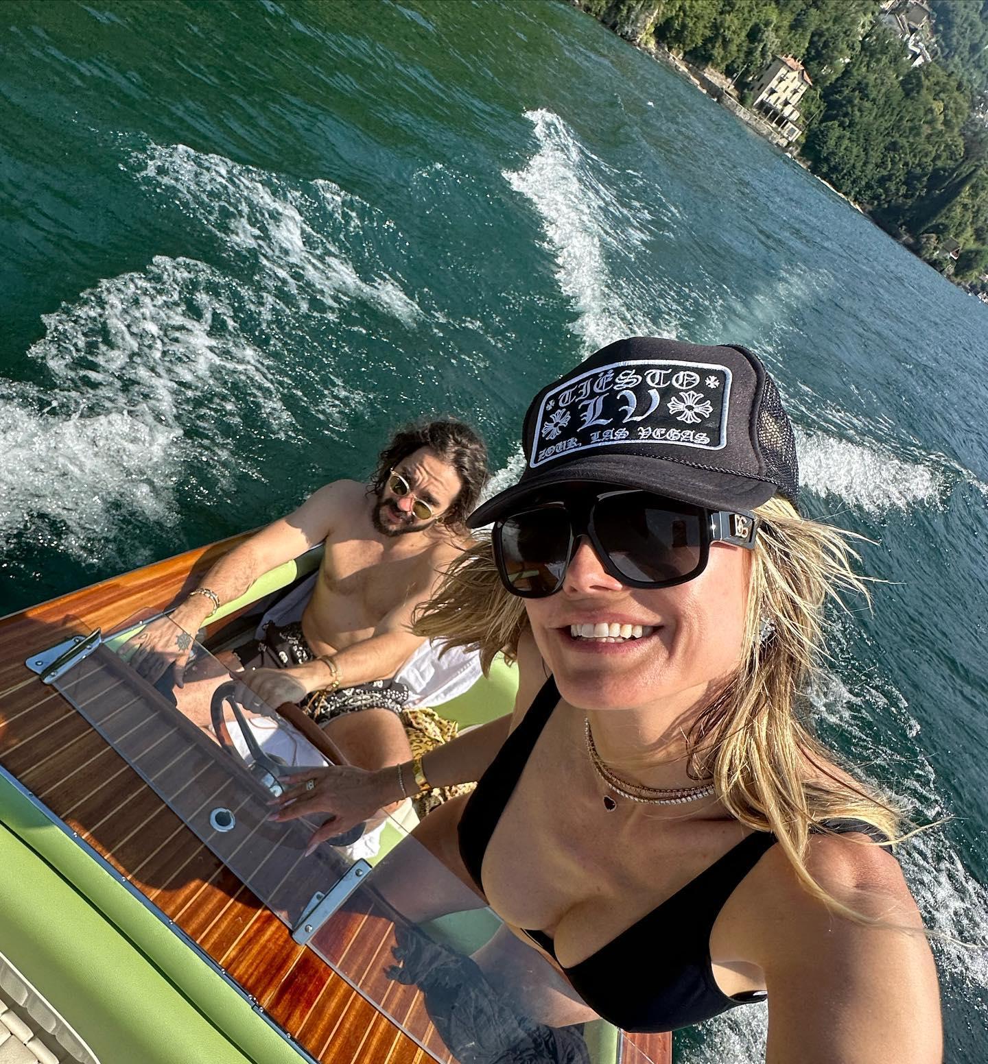 Heidi Klum Drives The Boat In Italy In Her Black Bikini