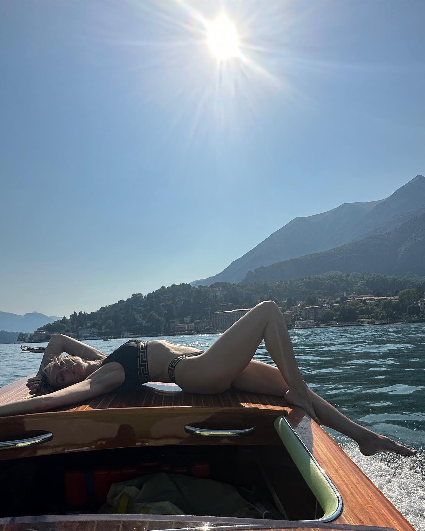 Heidi Klum Drives The Boat In Italy In Her Black Bikini